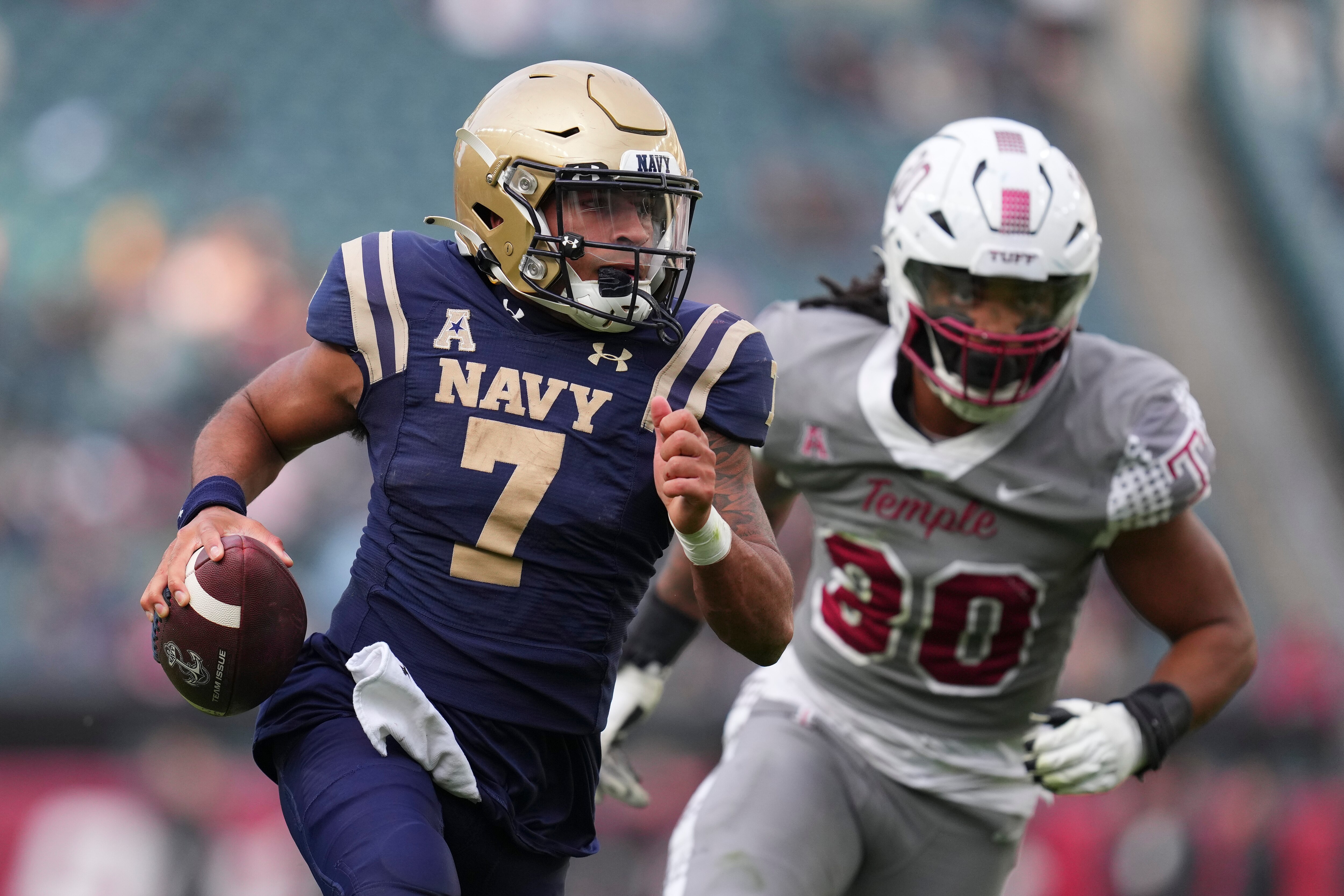 Xavier Arline had 94 yards passing and 109 yards rushing to lead Navy over Alabama-Birmingham.