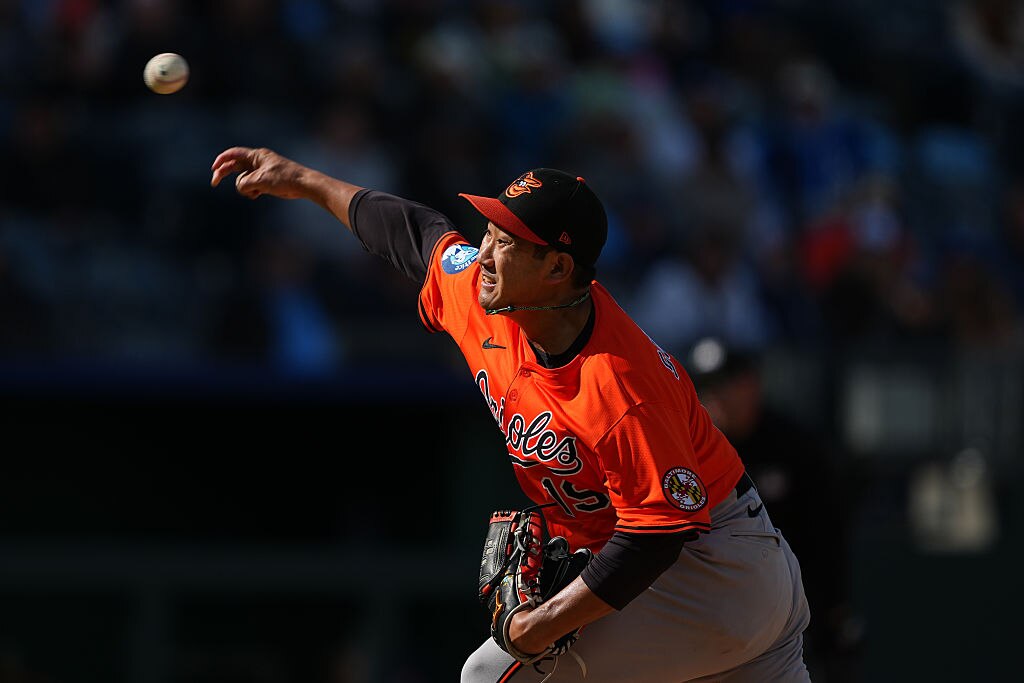 Tomoyuki Sugano pitches against the Kansas City Royals during the fifth inning.
