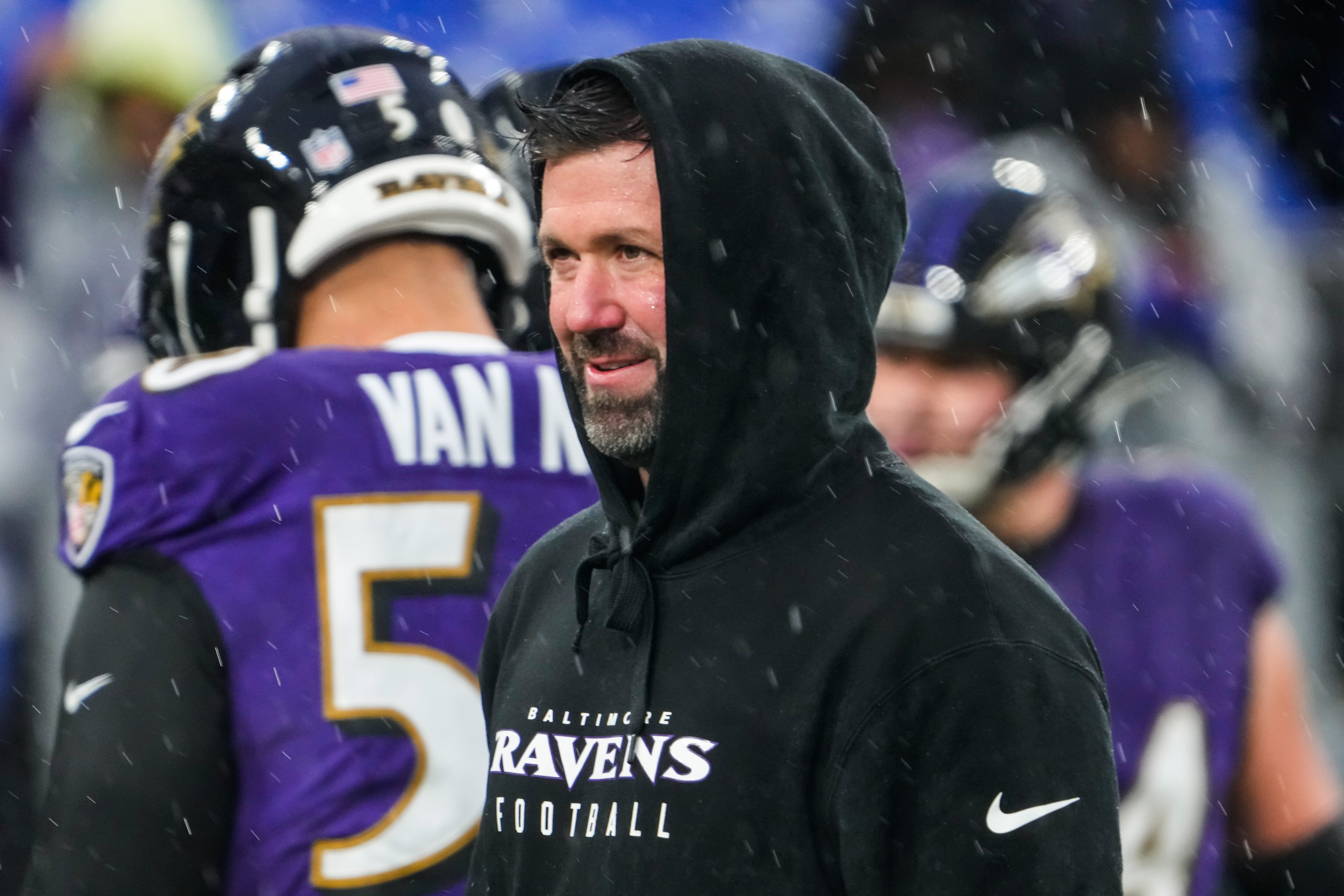 Baltimore Ravens strength and conditioning coordinator Scott Elliott walks on the field during warmups before the game against the Pittsburgh Steelers at M&T Bank Stadium on Saturday, Jan. 6, 2024.