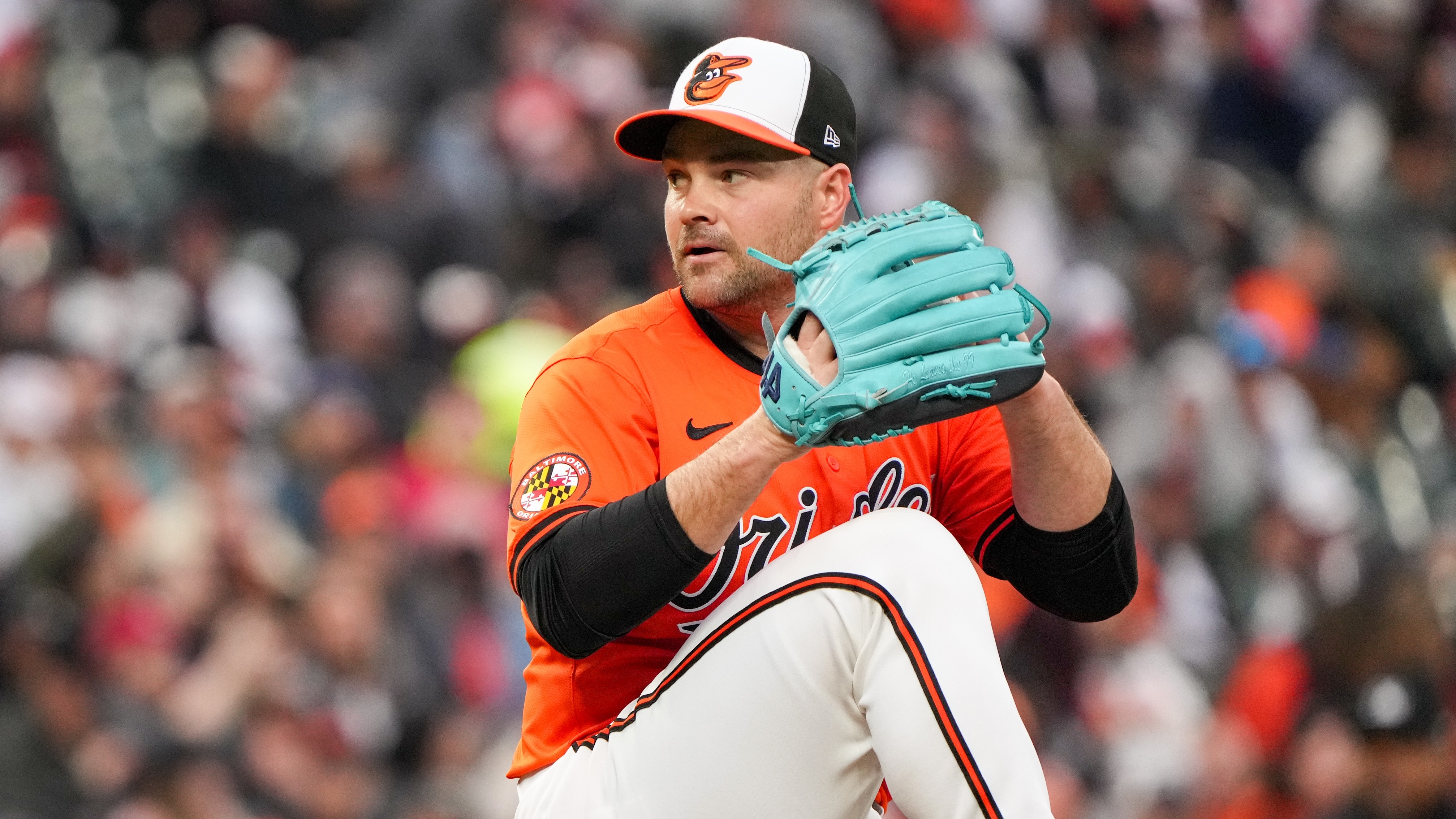 Baltimore Orioles relief pitcher Danny Coulombe (54) delivers a pitch in a game against the Los Angeles Angels at Camden Yards on March 30, 2024. The Baltimore Orioles beat the Angels, 13-4, to clinch a series win.