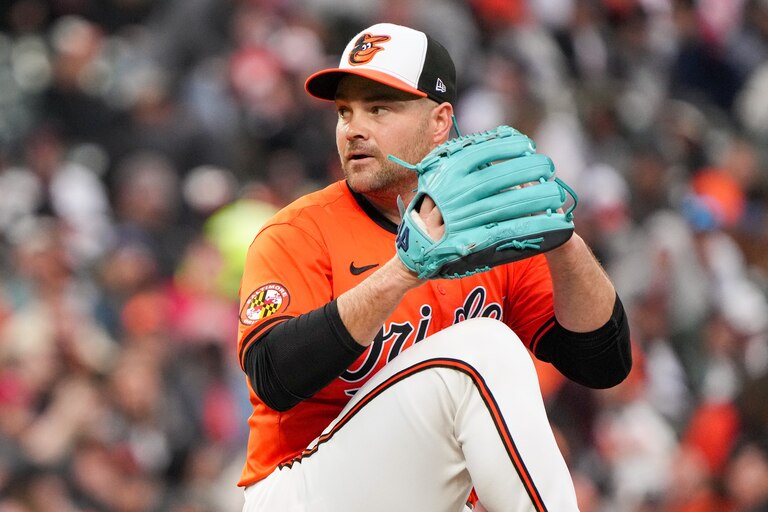 Baltimore Orioles relief pitcher Danny Coulombe (54) delivers a pitch in a game against the Los Angeles Angels at Camden Yards on March 30, 2024. The Baltimore Orioles beat the Angels, 13-4, to clinch a series win.