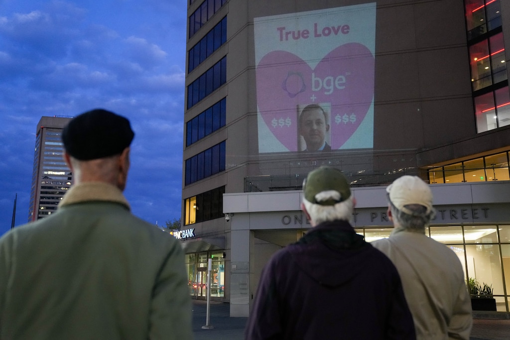 Members of Third Act Maryland project images protesting Senate President Bill Ferguson onto the side of the PNC Bank building in downtown Baltimore, Md. on Monday, April 6, 2026.