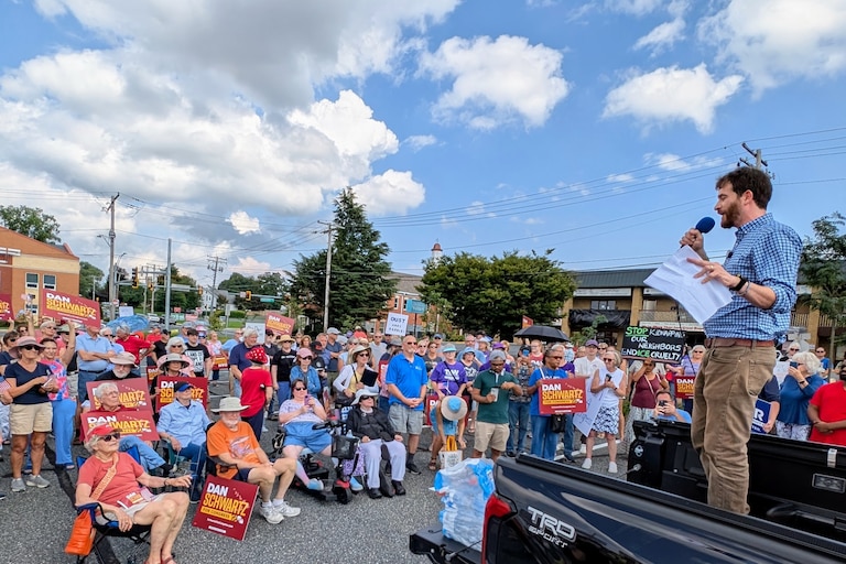 Dan Schwartz, the Democrat running for Congress in Maryland's 1st District, campaigns Aug. 20, 2026 in Bel Air. About 350 people turned out for a rally across the street from his opponent's district office.