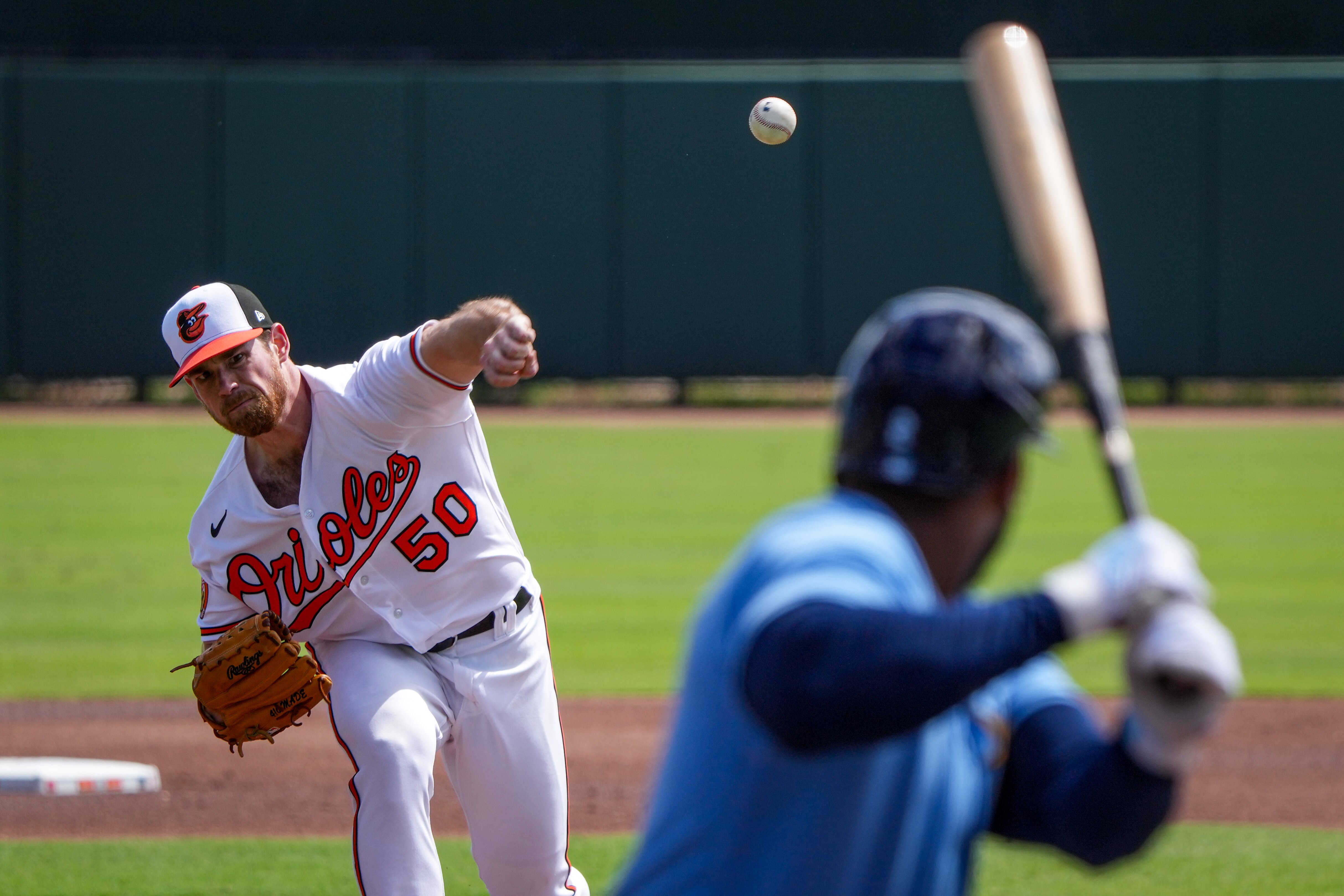 Orioles left-handed pitcher Bruce Zimmerman delivers a pitch in the first inning of a baseball game against the Tampa Bay Rays inside Ed Smith Stadium in Sarasota, Florida.
