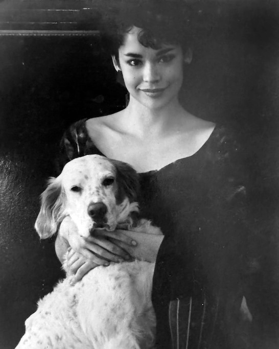 Thea Osato in 1980s with her pet dog.