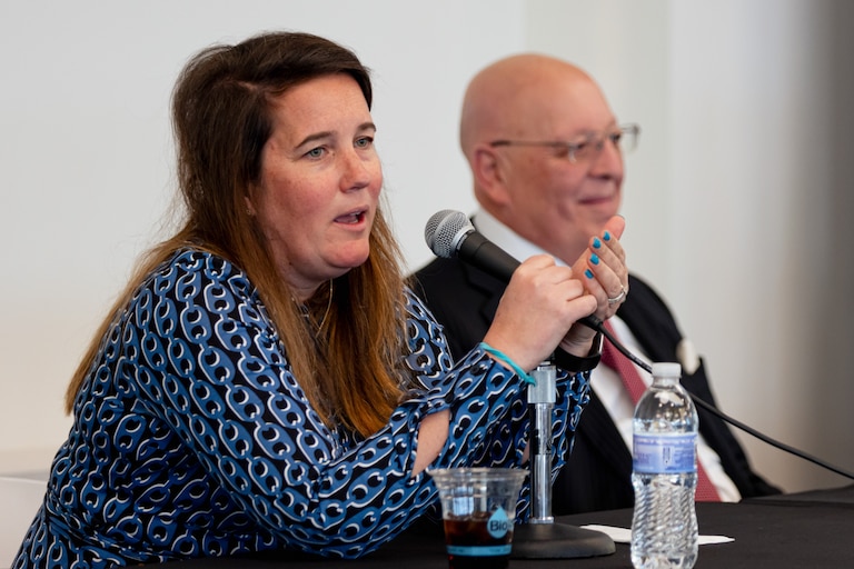 Former Baltimore County Inspector General Kelly Madigan, left, joins Maryland State Bar Association president Raphael J. Santini on a panel
