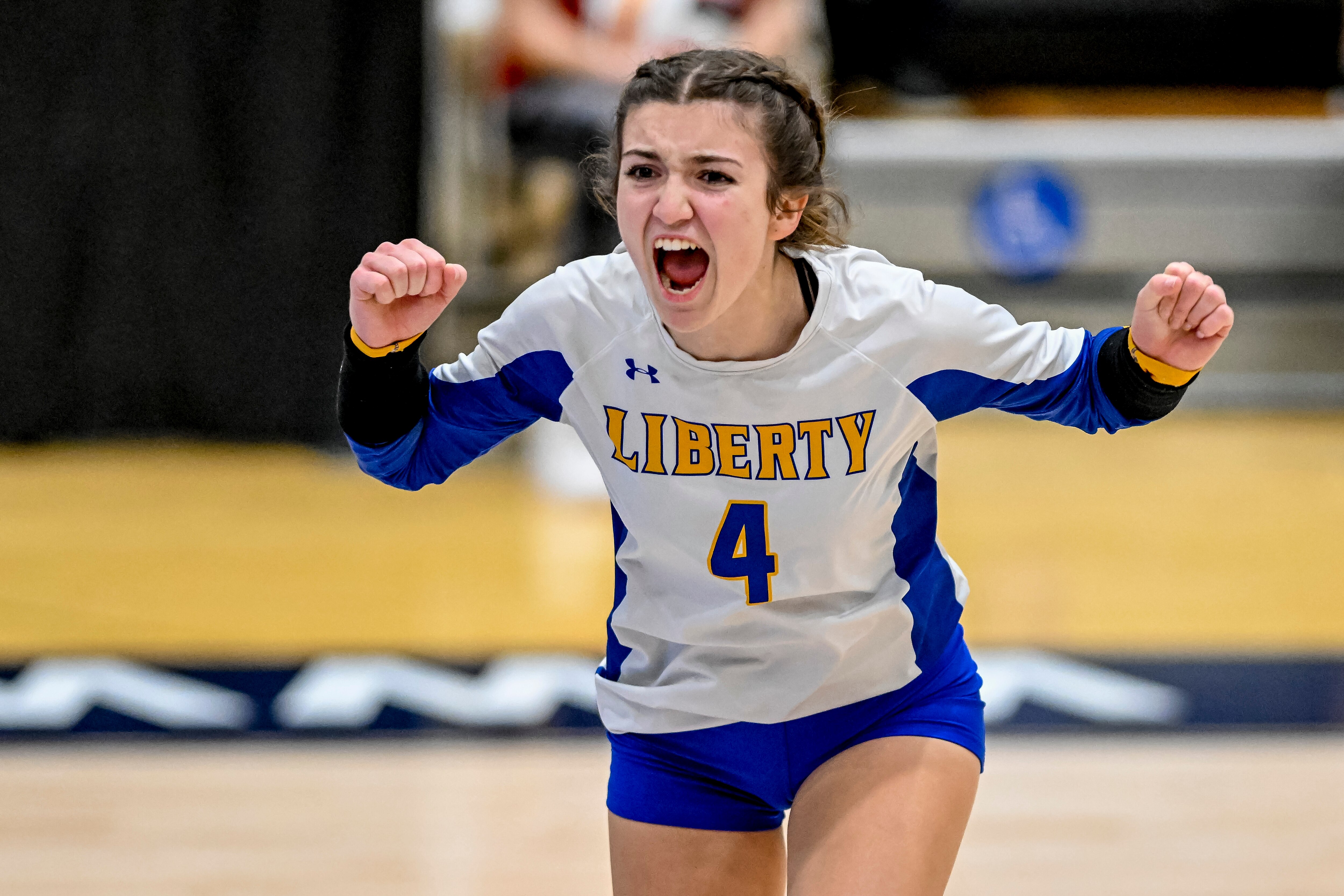 Liberty’s Grace Maerten (4) celebrates a point during the MPSSAA 2A Volleyball State Championship matchup between Liberty High School and Middletown High School at the APG Federal Credit Union Arena in Bel Air, Maryland.
