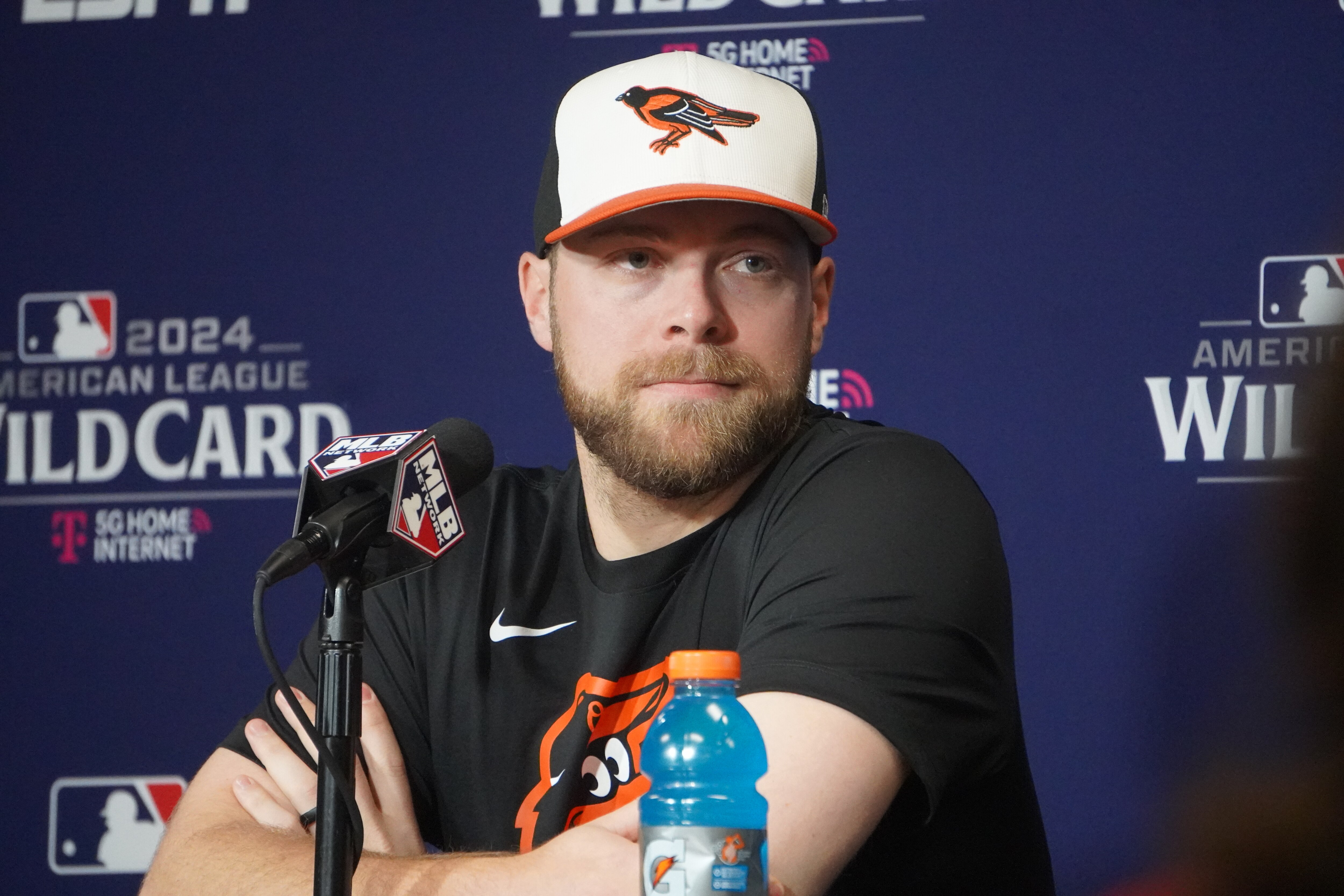 Corbin Burnes sits in front of the media as the Orioles prepare for their Wild Card Series workout.