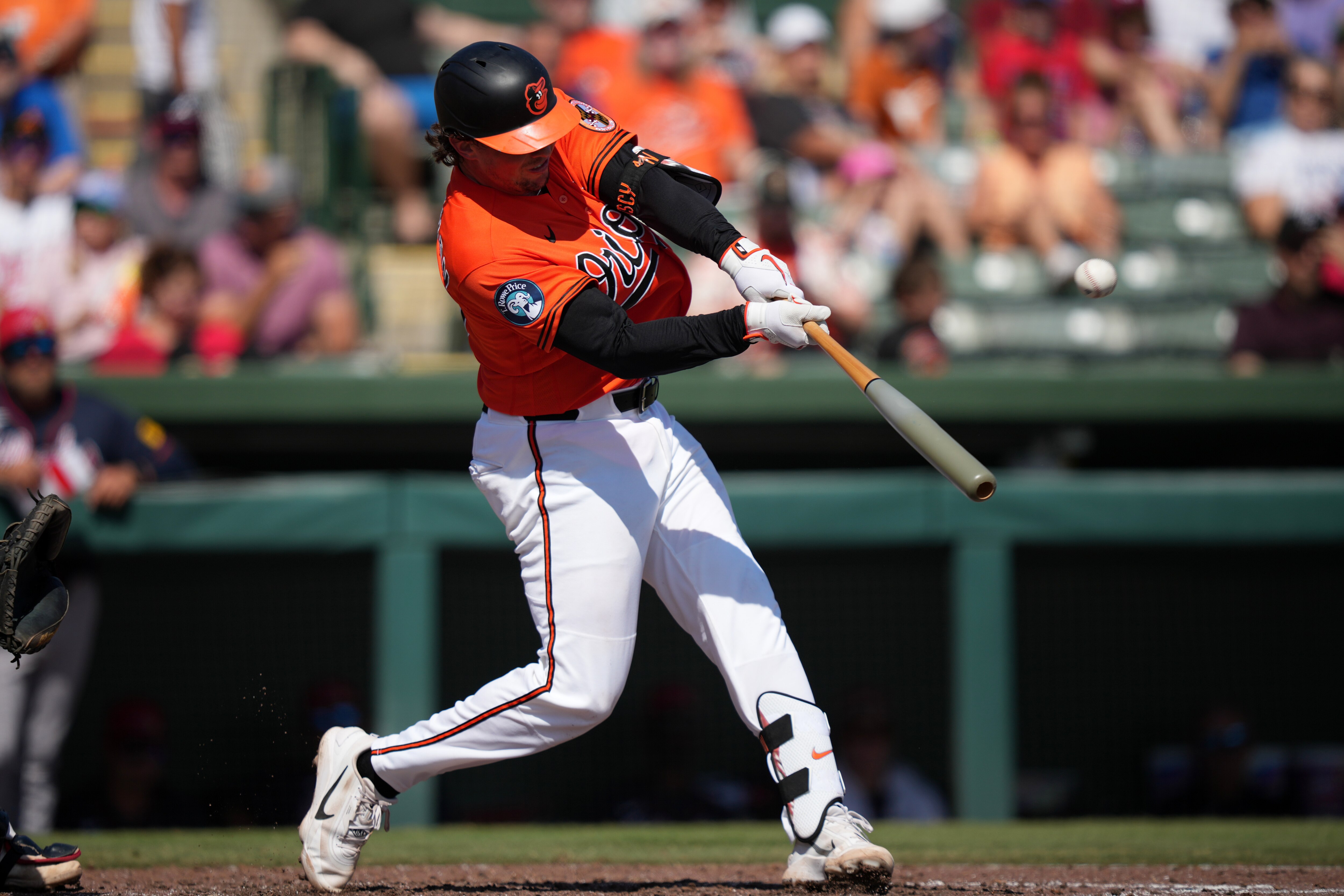 Baltimore Orioles' Adley Rutschman hits a home run against Atlanta Braves pitcher Martín Pérez during the fifth inning of a spring training baseball game, Saturday, Feb. 28, 2026, in Sarasota. (AP Photo/Matt Slocum)