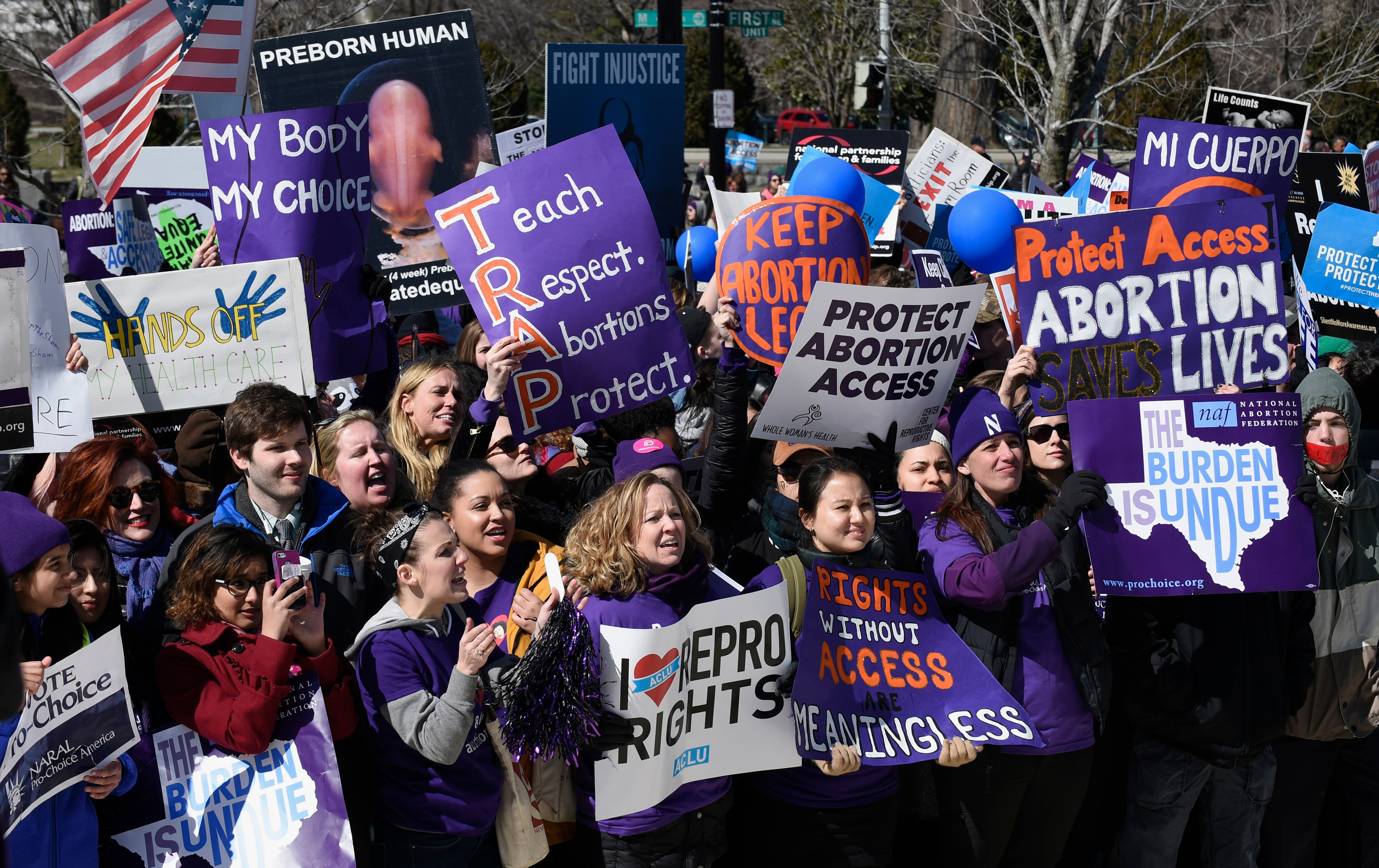Pro-abortion rights protesters rally outside the Supreme Court in Washington, Wednesday, March 2, 2016.