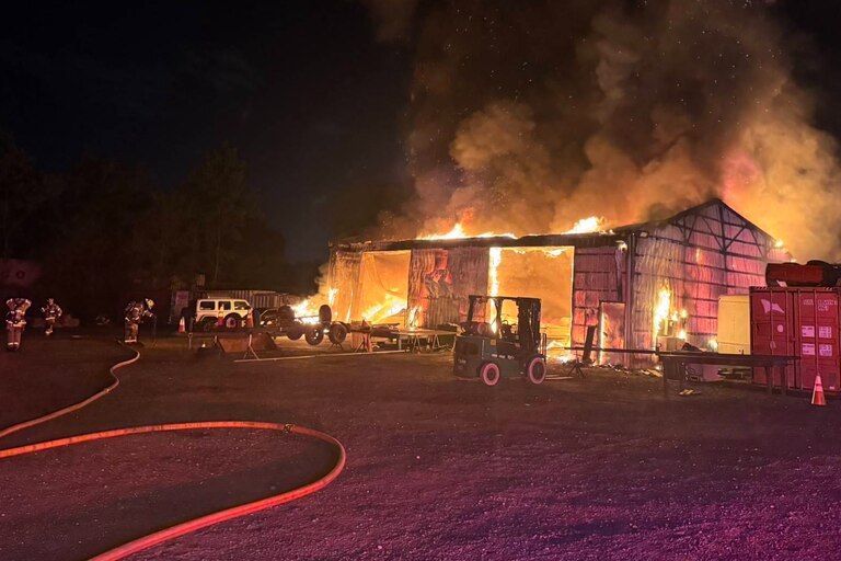 Baltimore County firefighters extinguished a fully involved commercial garage fire in the 500 block of Earls Road in Middle River early Saturday morning, May 16, 2026, with no injuries reported, officials said.