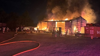 Baltimore County firefighters extinguished a fully involved commercial garage fire in the 500 block of Earls Road in Middle River early Saturday morning, May 16, 2026, with no injuries reported, officials said.
