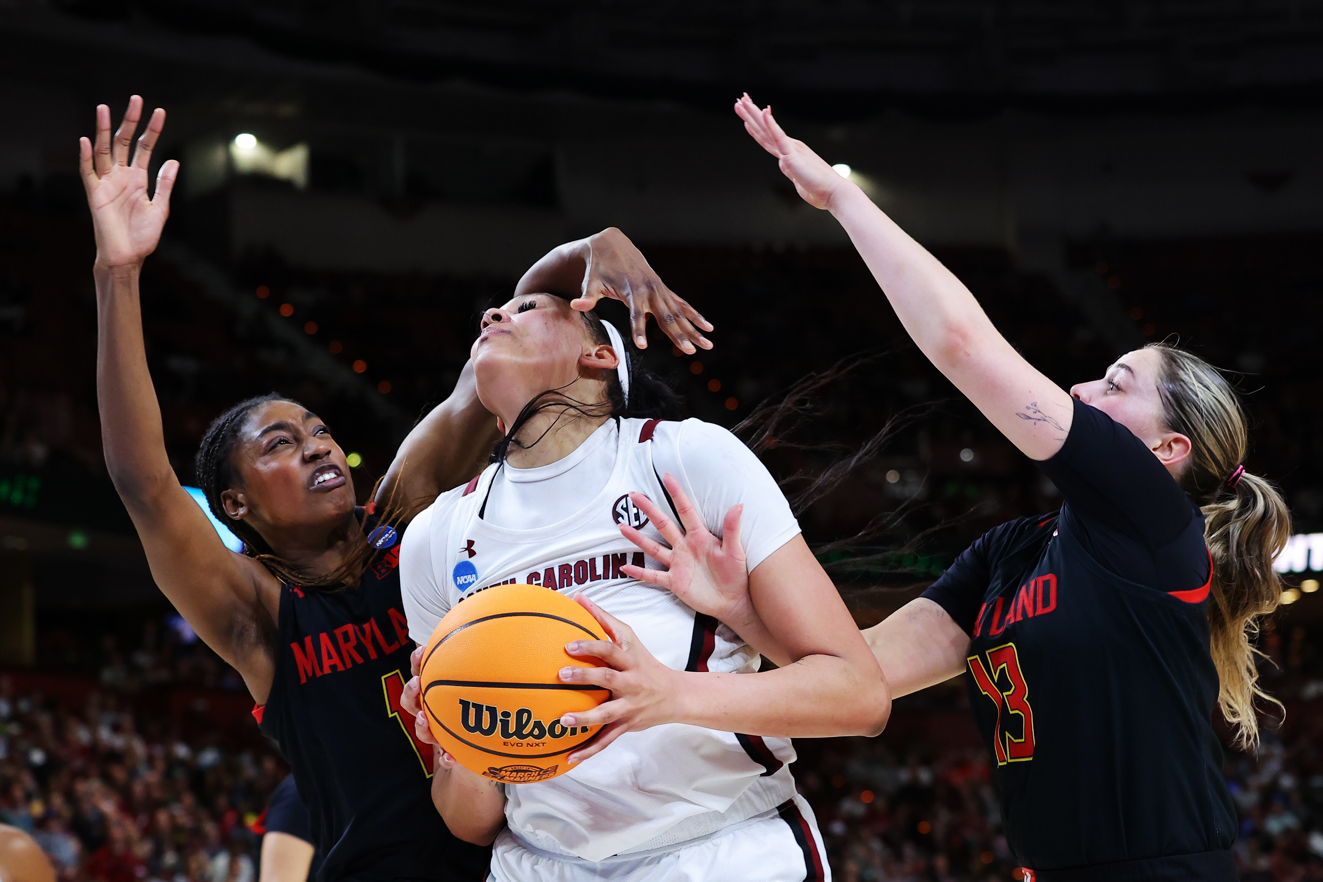 Kamilla Cardoso #10 of the South Carolina Gamecocks drives against Diamond Miller #1 of the Maryland Terrapins during the fourth quarter in the Elite Eight round of the NCAA Women's Basketball Tournament at Bon Secours Wellness Arena on March 27, 2023 in Greenville, South Carolina.