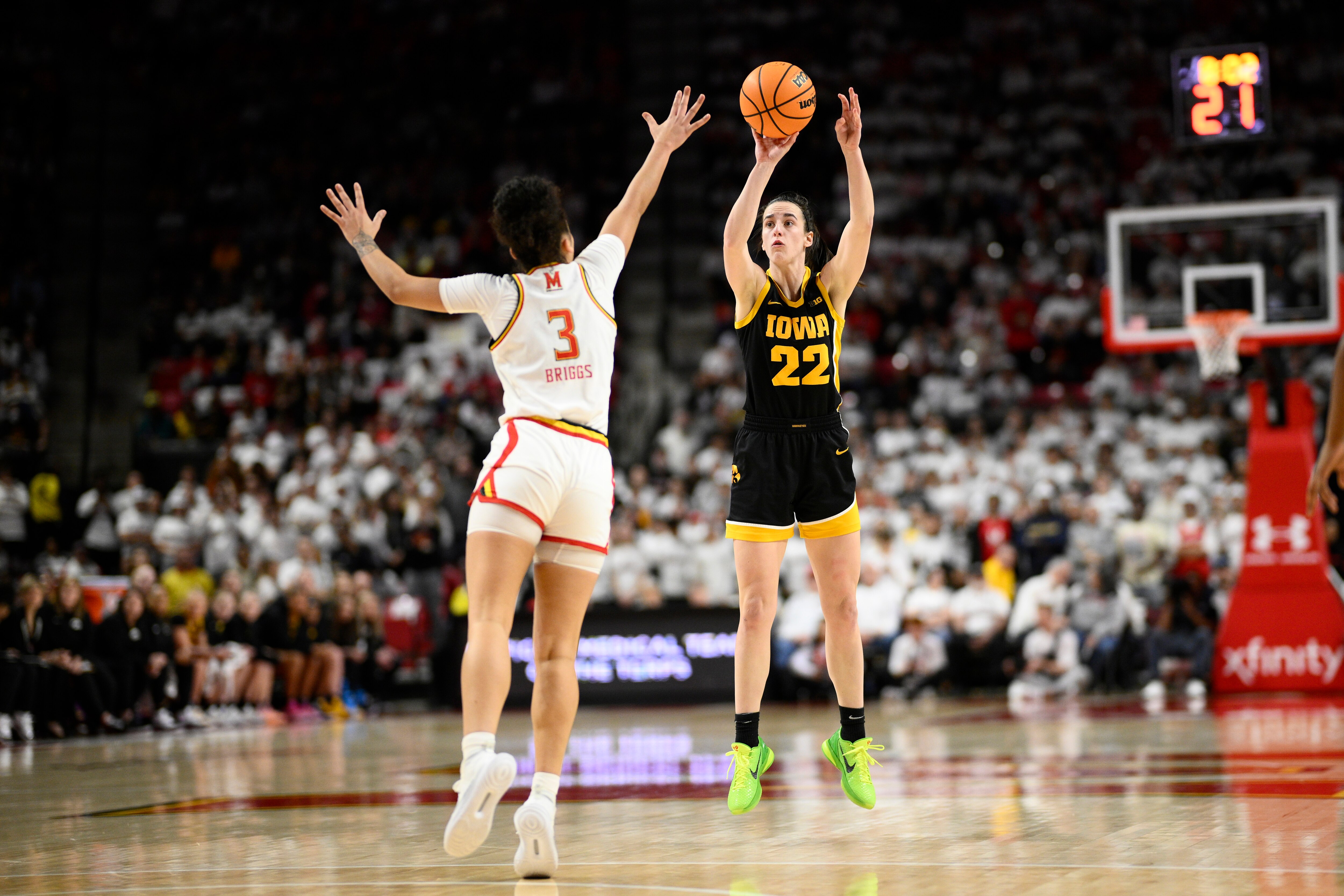 Iowa guard Caitlin Clark shoots against Maryland guard Lavender Briggs during the first half. Clark scored 38 points in the 93-85 Hawkeyes victory.