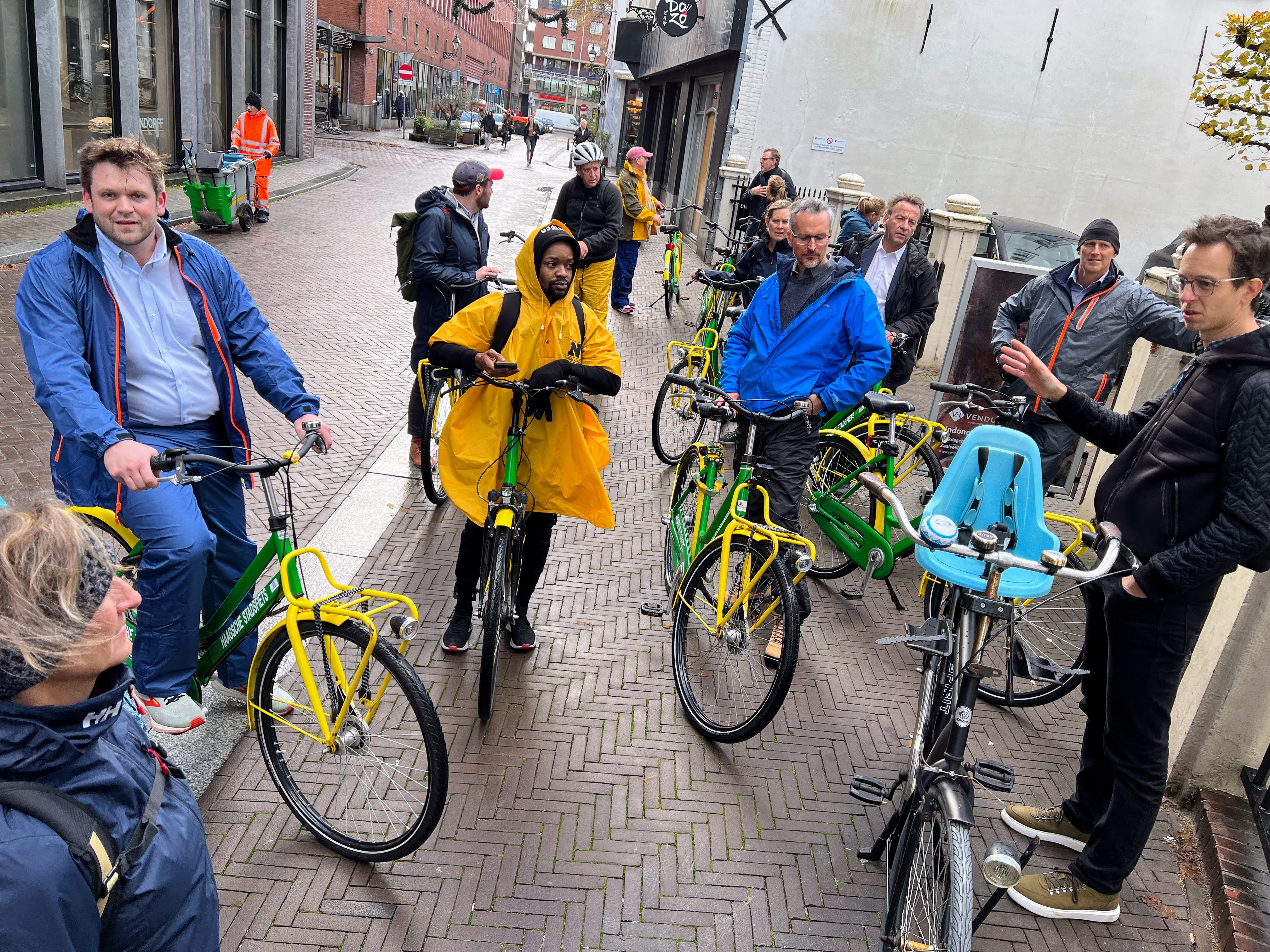 Alderman Rob Savidge, center right, listens as Marco Mulder of the firm Arcadis, far right, talks about sustainable design elements during a tour of the Dutch city of Scheveningen in November 2023.