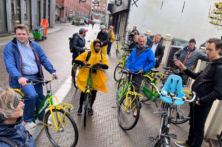 Alderman Rob Savidge, center right, listens as Marco Mulder of the firm Arcadis, far right, talks about sustainable design elements during a tour of the Dutch city of Scheveningen in November 2023.
