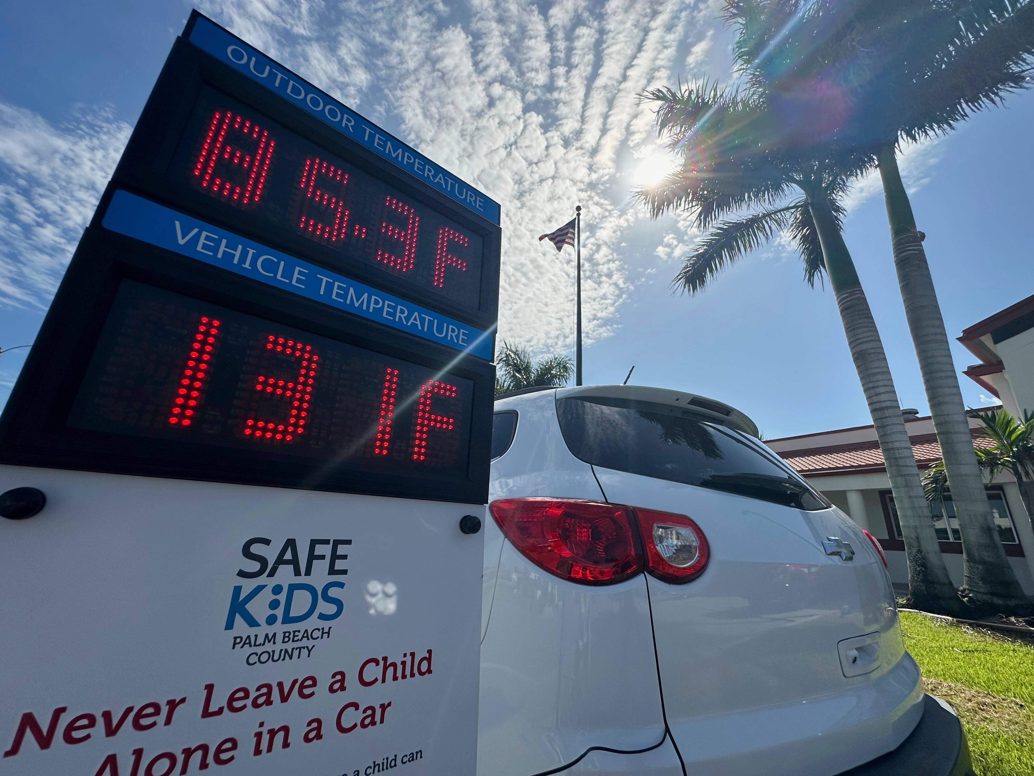 Outside temperature is displayed in comparison to the inside temperature of a vehicle on Thursday June 26, 2025 in Belle Glade, Fla. during an event to raise awareness about the dangers of leaving children unattended in vehicles. (AP Photo/Cody Jackson)