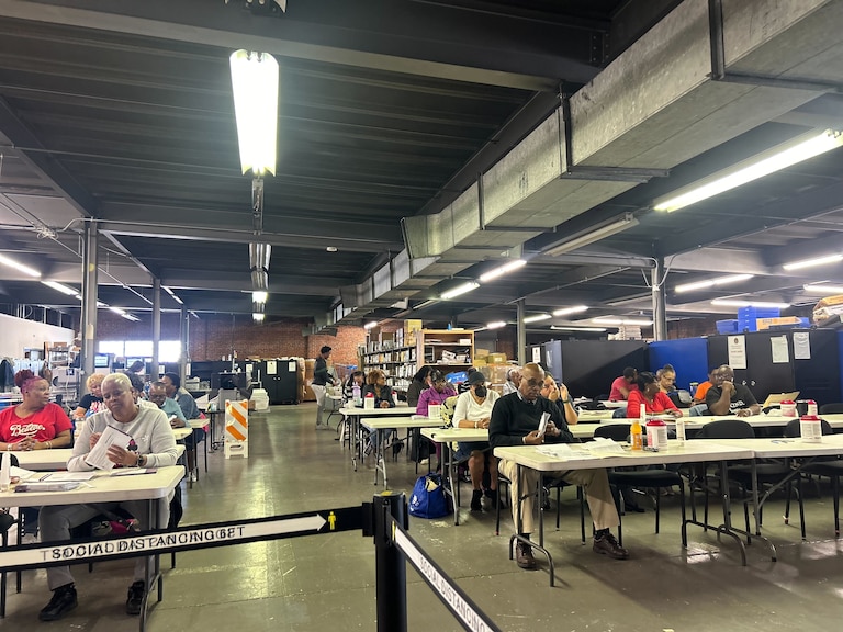 Baltimore City Board of Elections workers open mail-in ballots at the board's West Baltimore warehouse on Thursday, May 16.