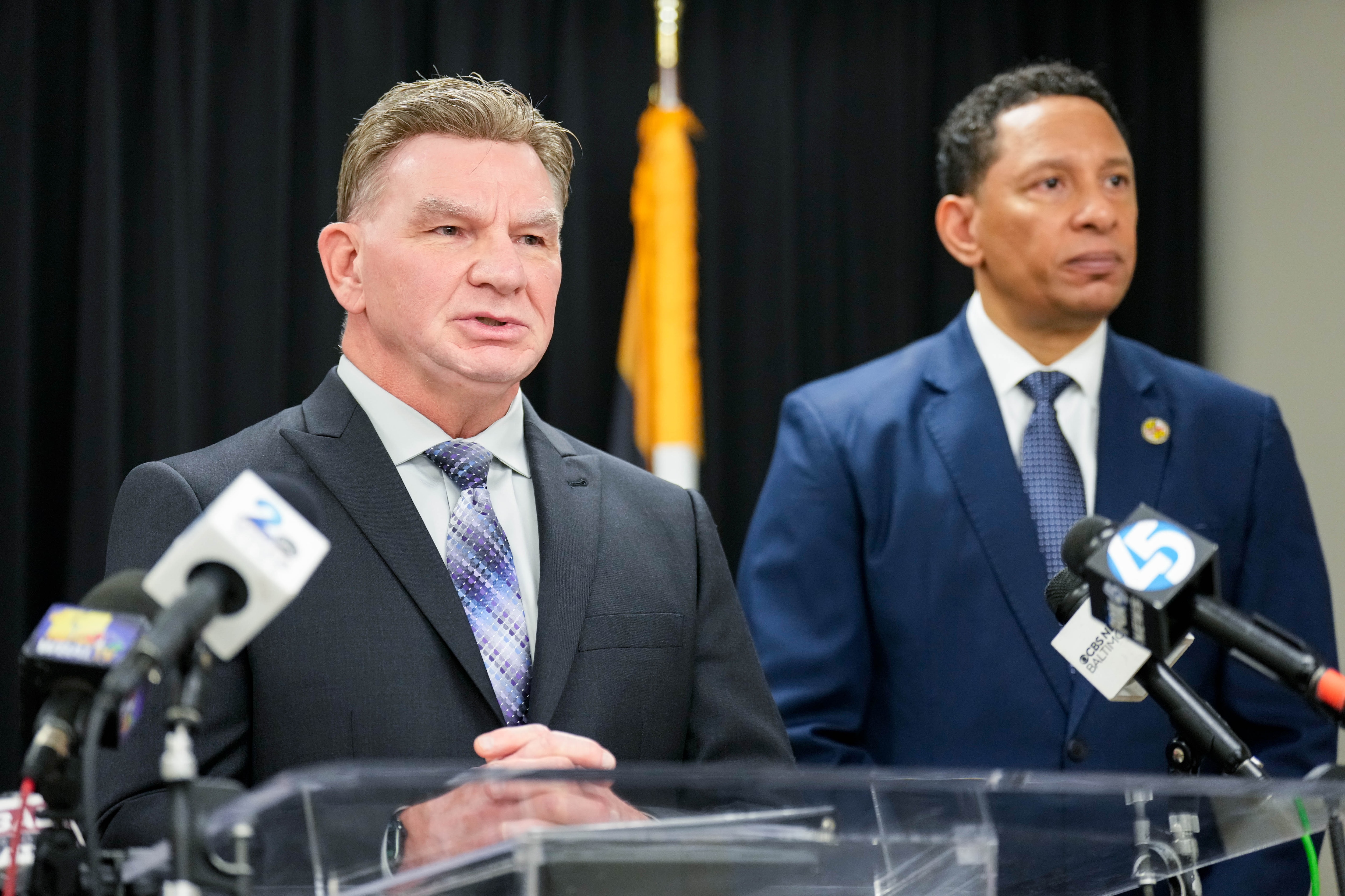Baltimore Police Commissioner Richard Worley, left, joins State’s Attorney Ivan Bates during a news conference Thursday to discuss charges against Yolanda Wilkes.