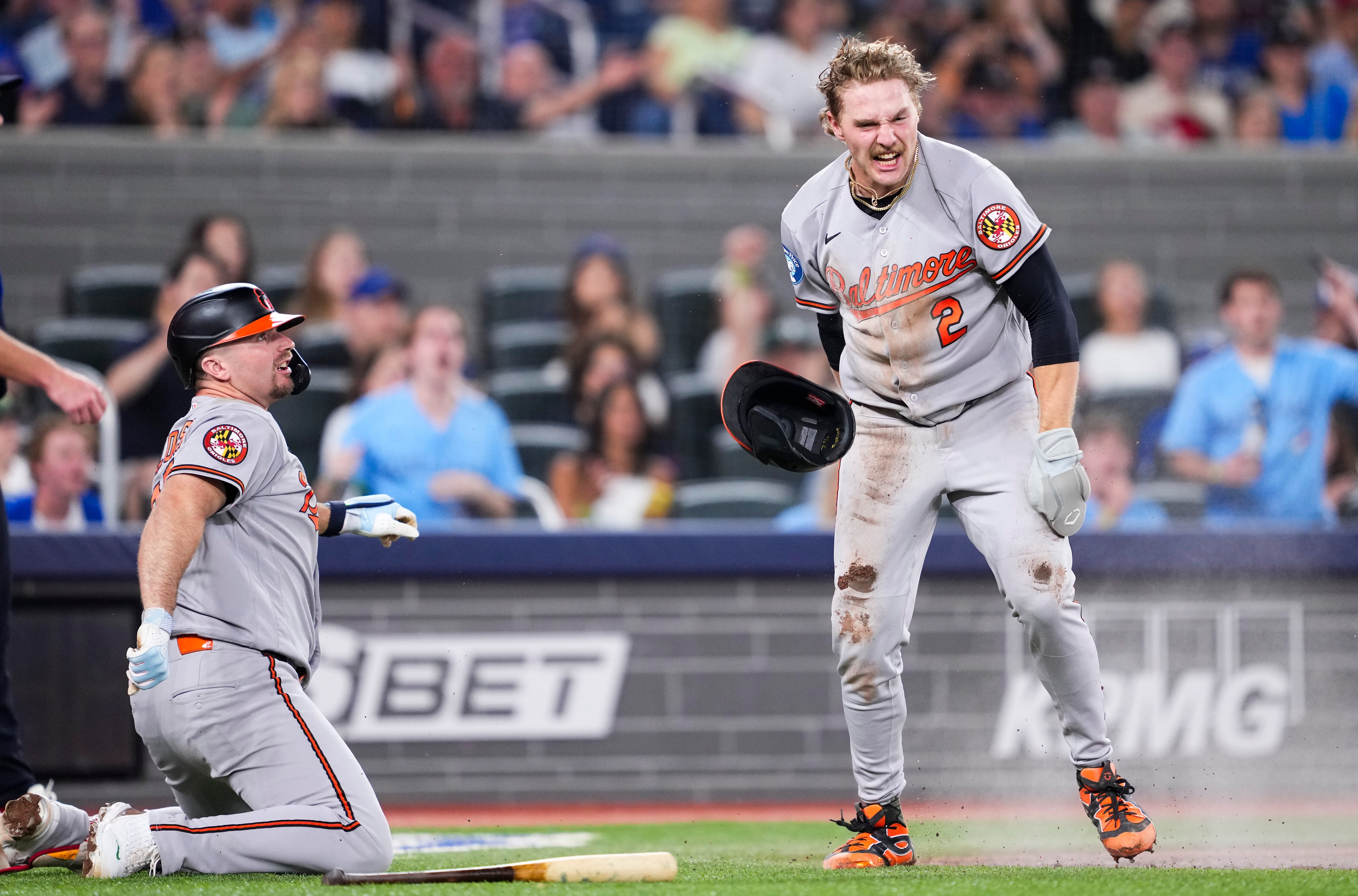 Gunnar Henderson scores after dashing around the bases on a double by Adley Rutschman in the sixth inning.