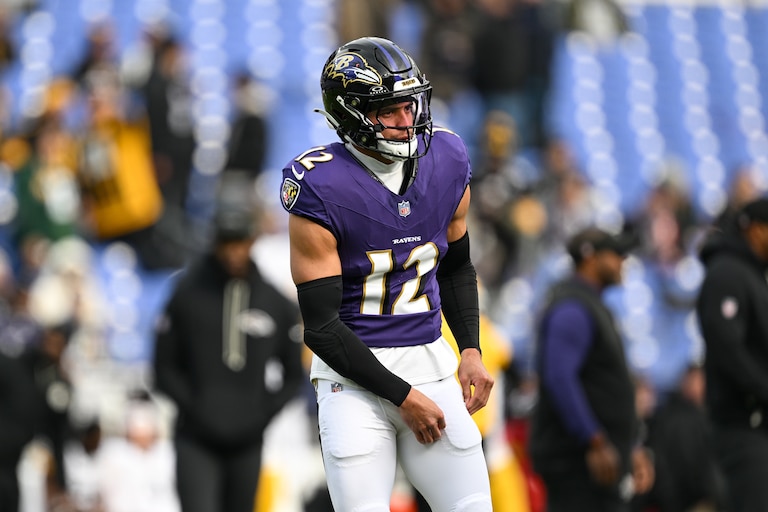Baltimore Ravens safety Alohi Gilman (12) looks on during pre-game warm-ups before an NFL football game against the Pittsburgh Steelers, Sunday, Dec. 7, 2025, in Baltimore.