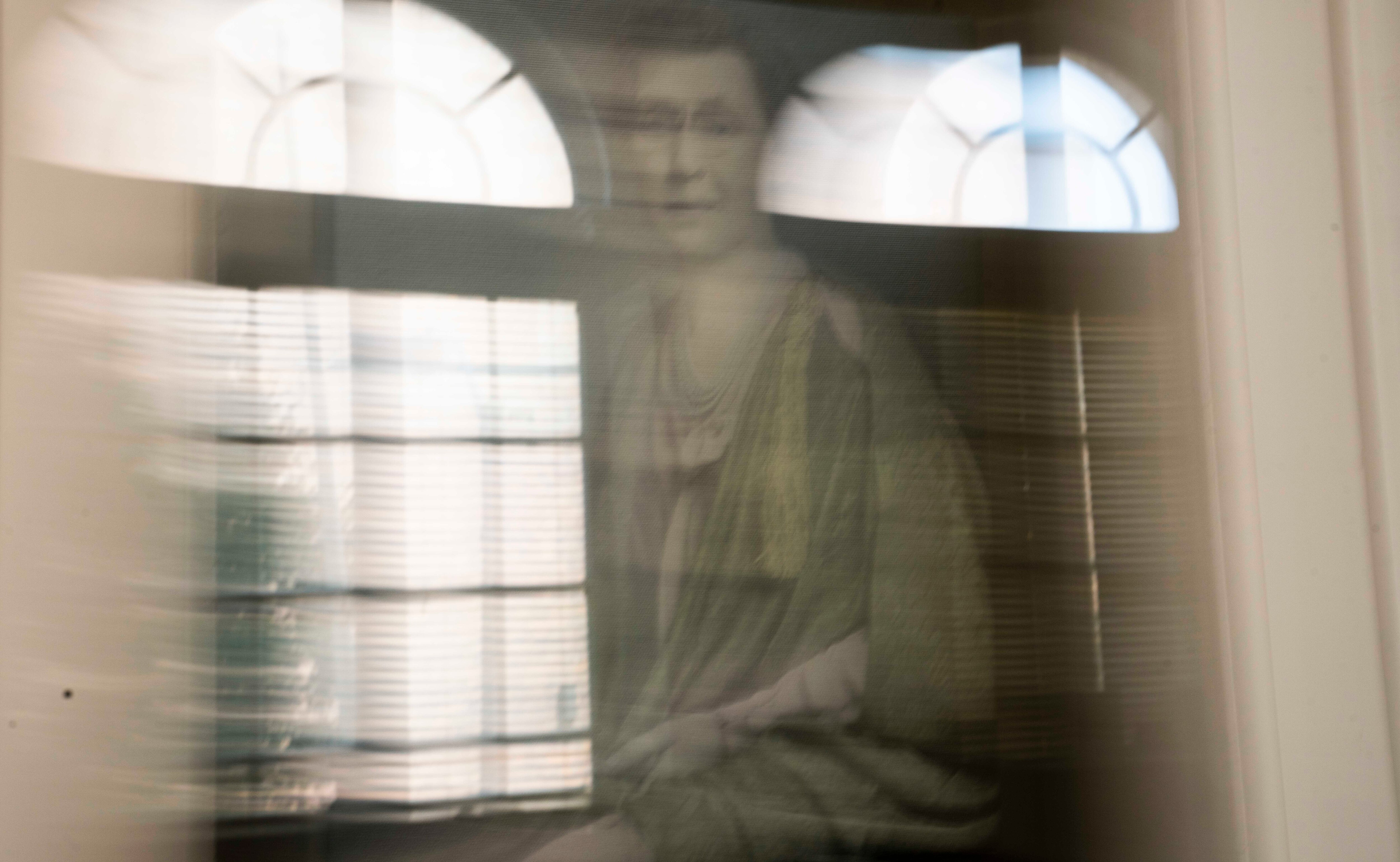 The ghost of Marcia Crocker Noyes, the librarian of 50 years at the Maryland State Medical Society’s library in Mount Vernon, is often heard and sometimes seen in the library stacks, the reading room and her old office. These images were created in-camera with the double-exposure method using a portrait of Noyes over the places she’s haunted.