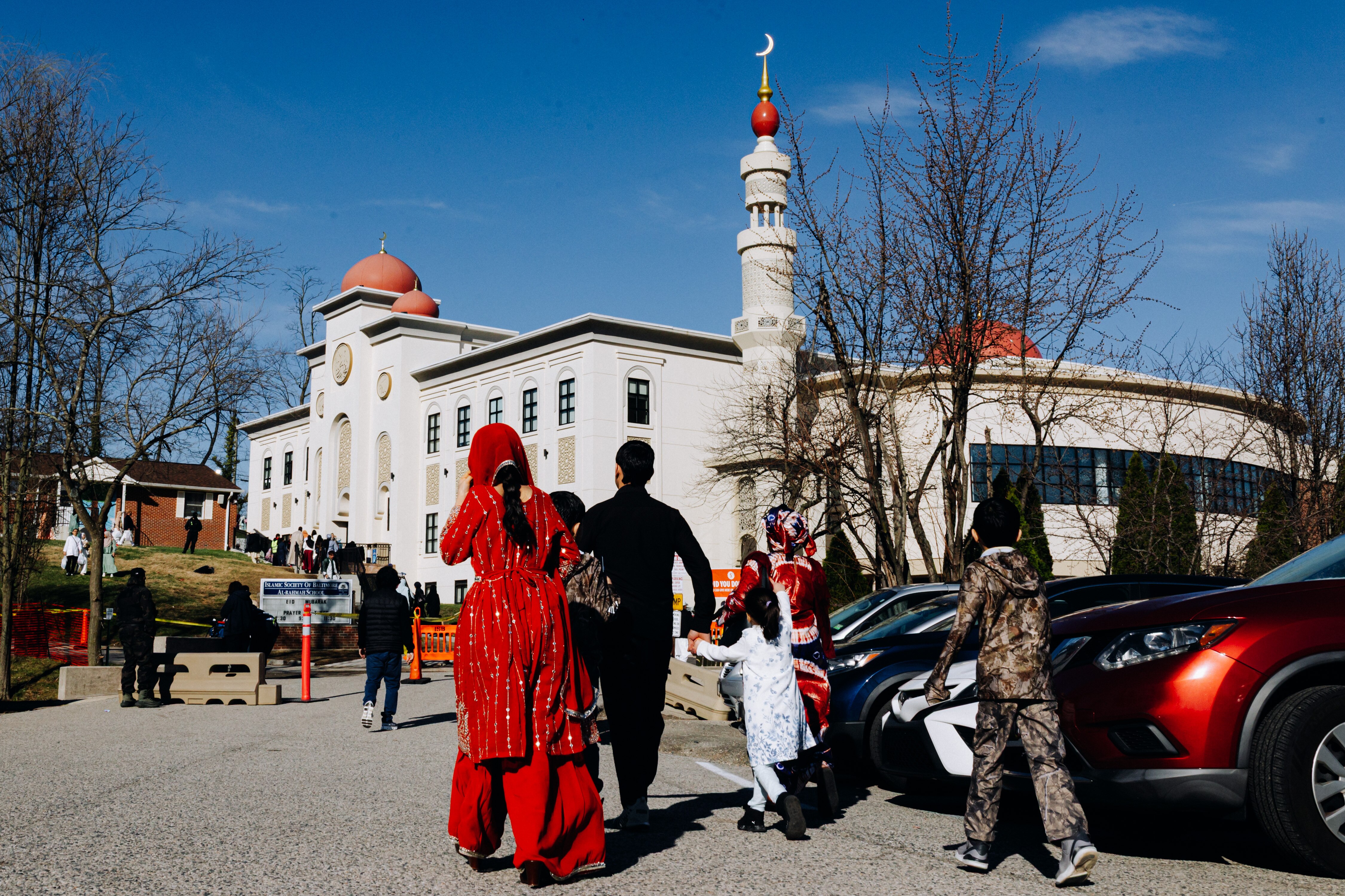 Community members file into the masjid ahead of the second prayer of Eid al-Fitr, at the Islamic Society of Baltimore, on Friday.