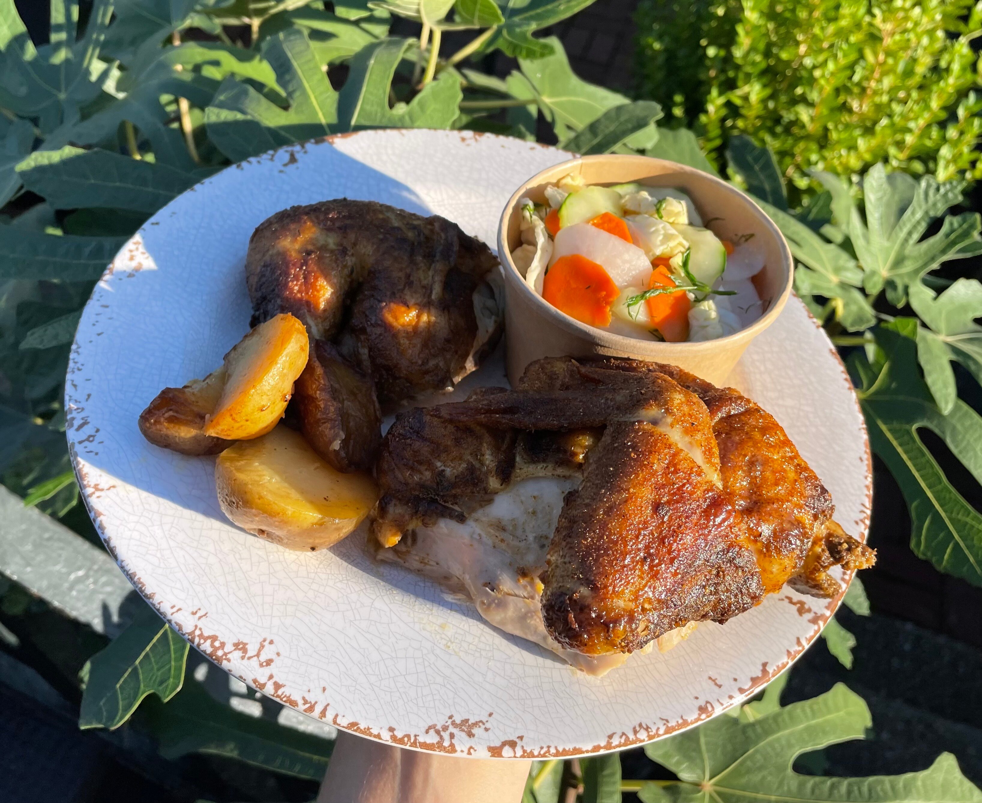 Takeout chicken and sides from Chachi's (as seen at the home of Baltimore Banner reporter Christina Tkacik).