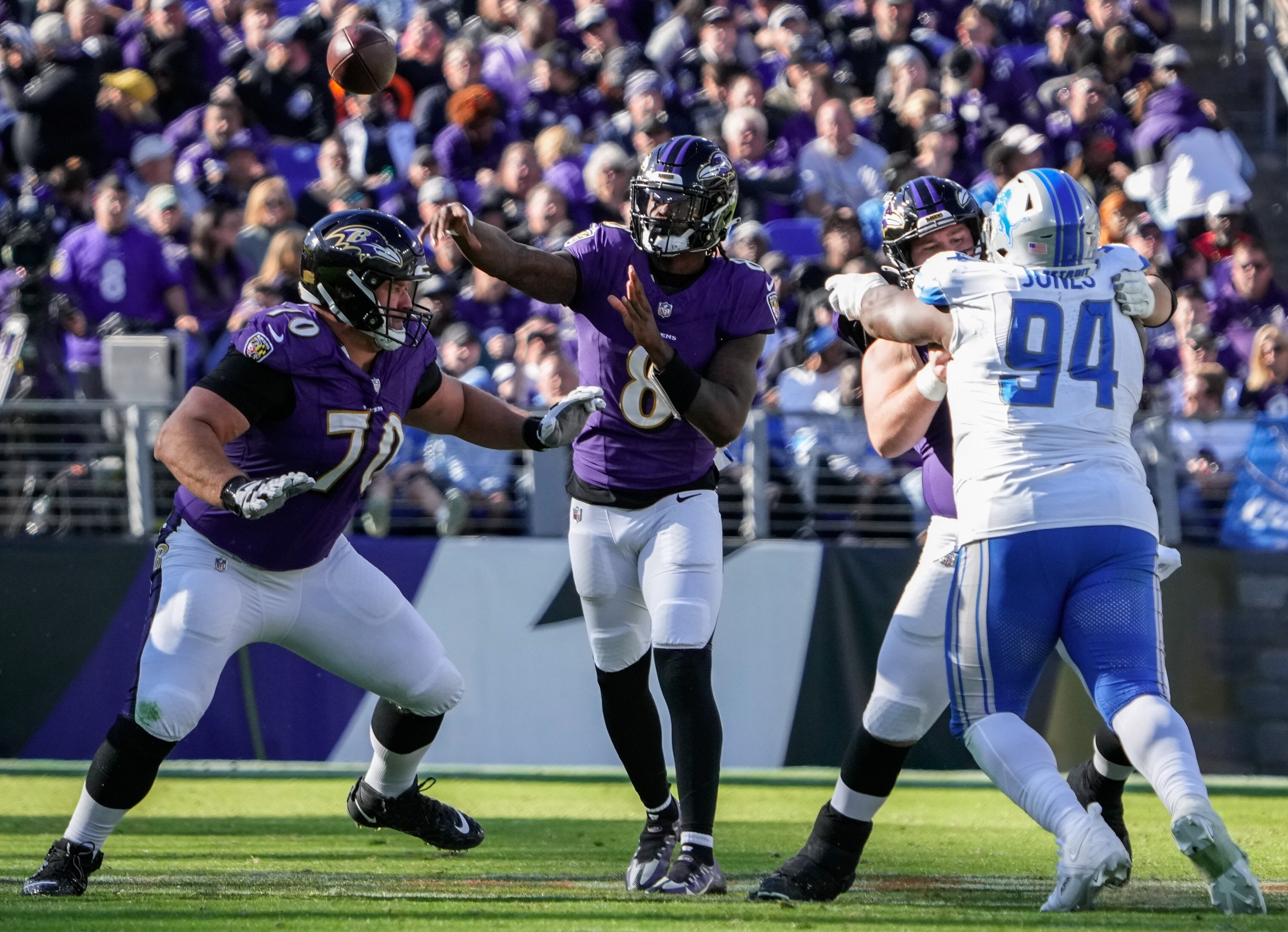 Baltimore Ravens quarterback Lamar Jackson (8) throws the ball during the fourth quarter against the Detroit Lions at M&T Bank Stadium on Sunday, Oct. 22, 2023.