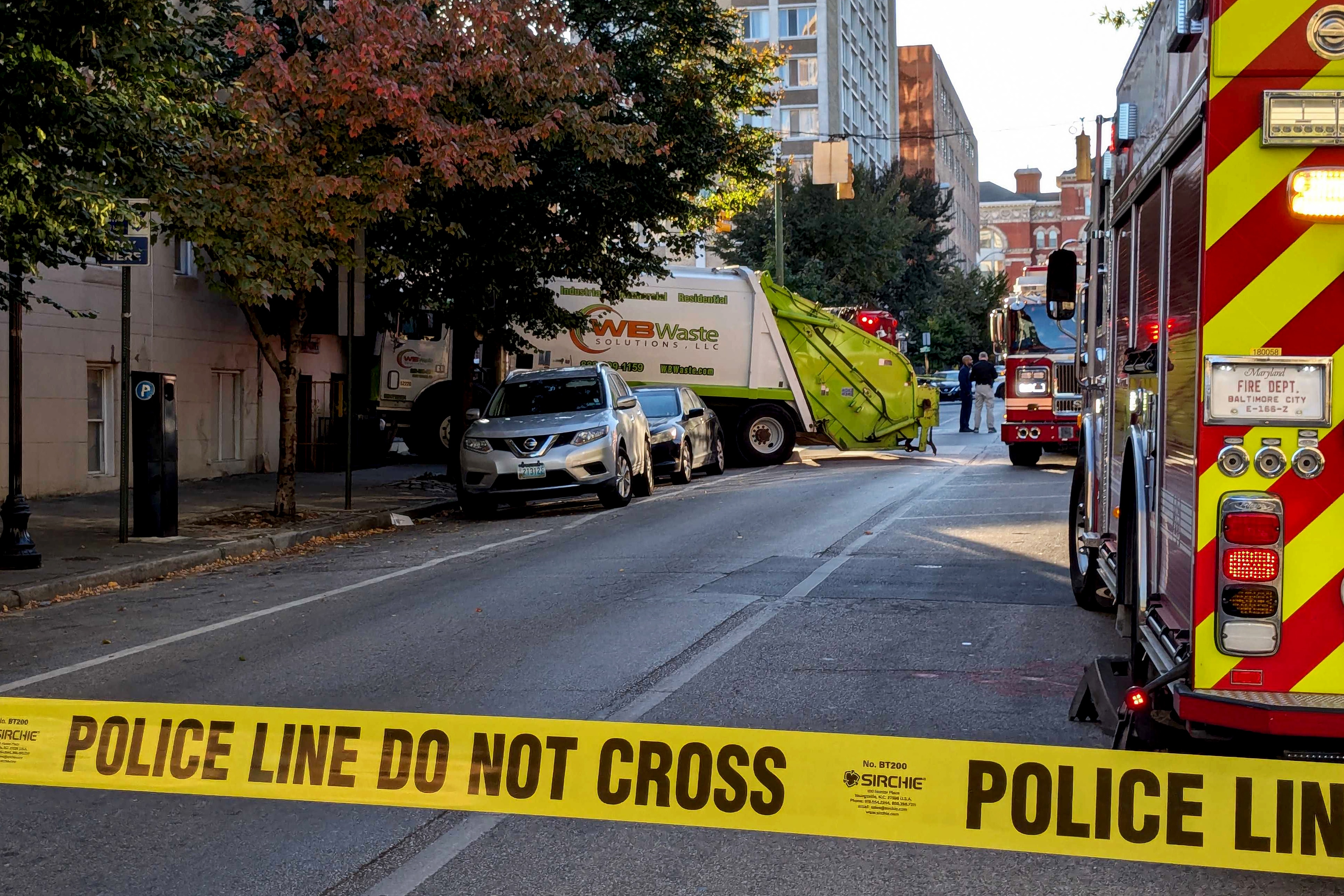 Baltimore Police, Fire and the City Office of Emergency Management on the scene of a collision near the intersection of Cathedral and Centre Streets in Baltimore on Friday, Oct. 18, 2024.
