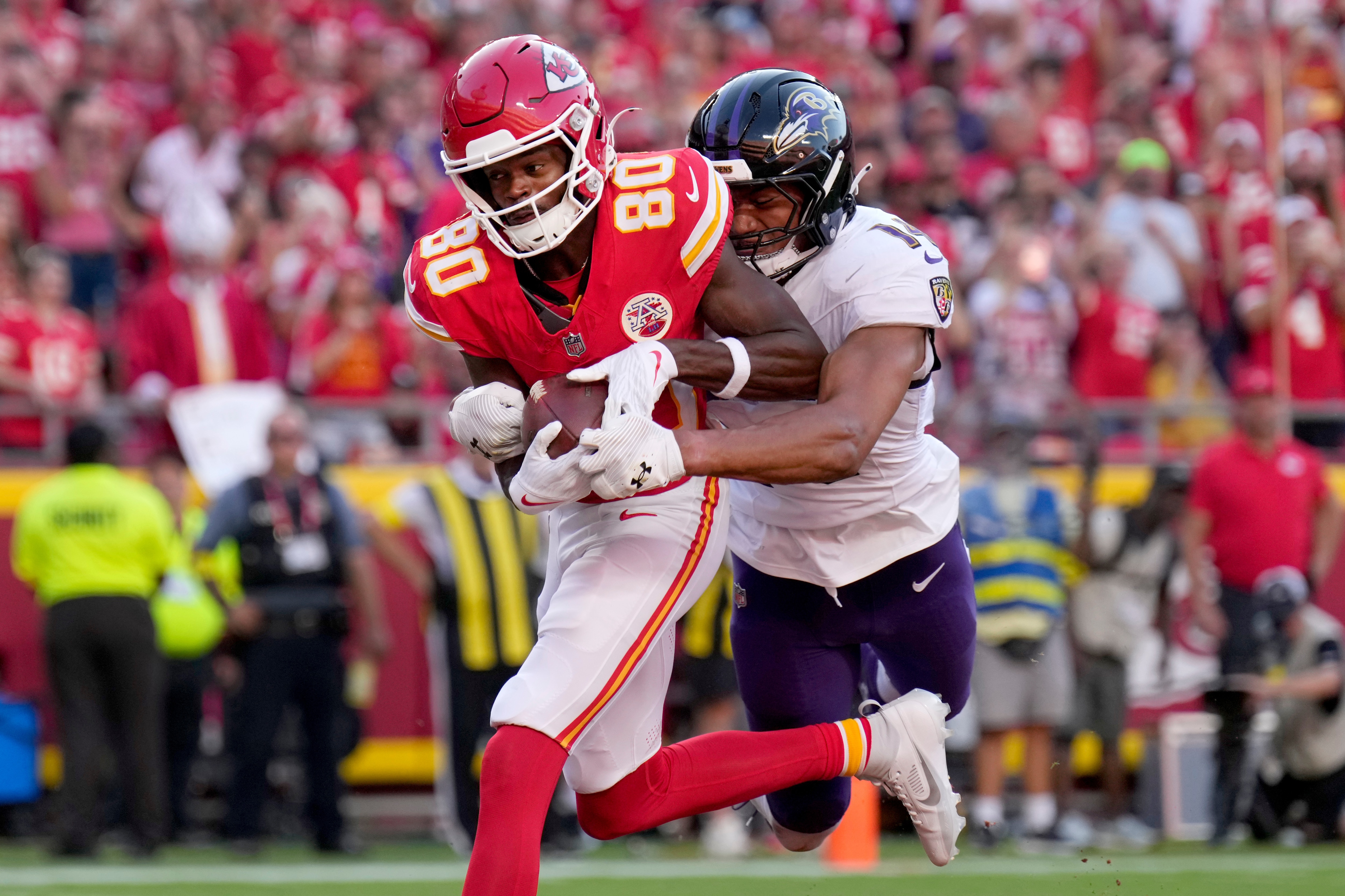Chiefs wide receiver Tyquan Thornton catches a touchdown pass as Ravens safety Kyle Hamilton defends during the second half Sunday.