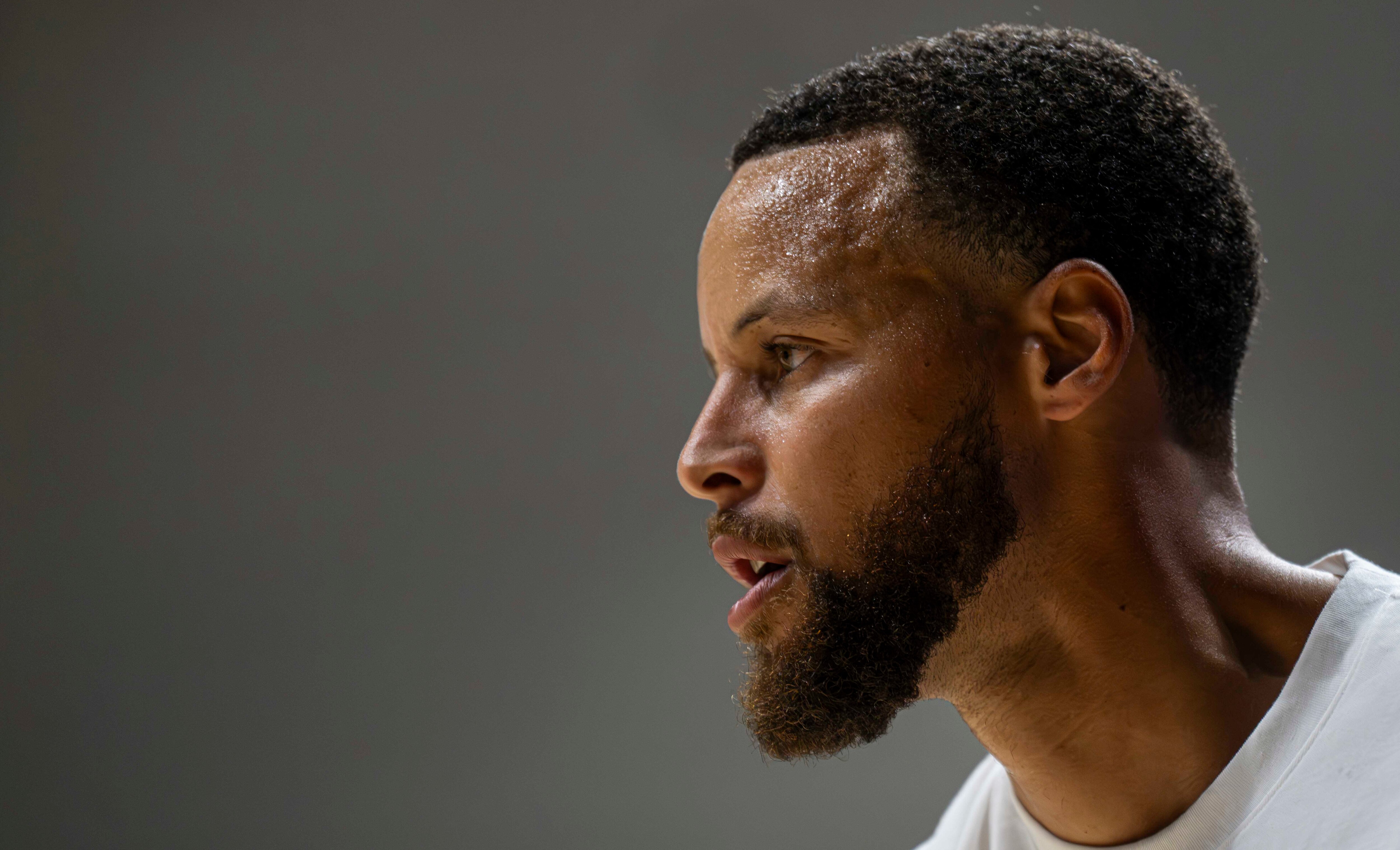 Warriors basketball player Stephen Curry practices on the court at the Stephen Curry Baltimore Showcase Live at UMBC on August 17, 2023.