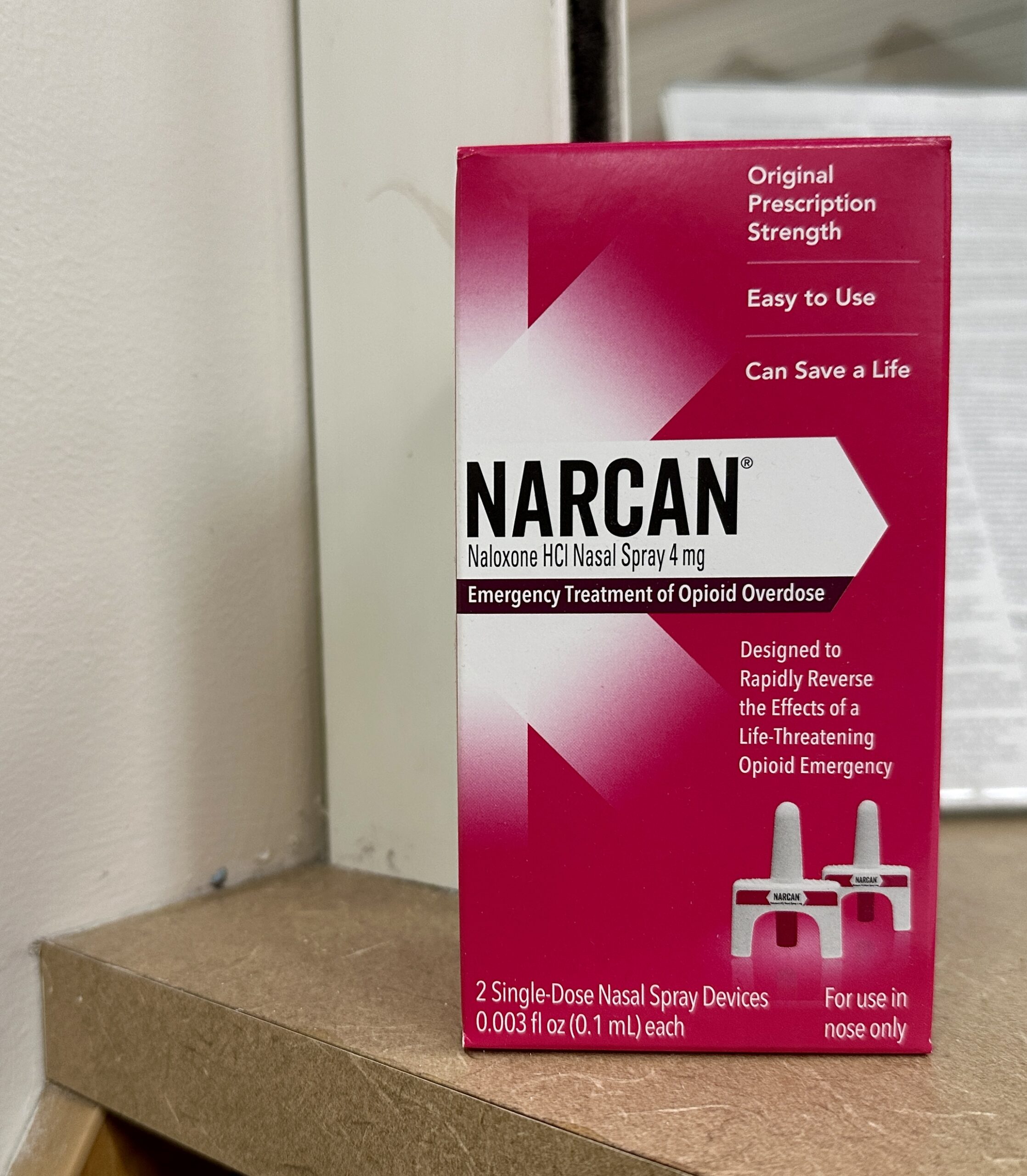 A box of Narcan nasal spray, the opioid-reversing medication that has been approved for over-the-counter use, sits on a pharmacy counter on Feb. 22, 2024.