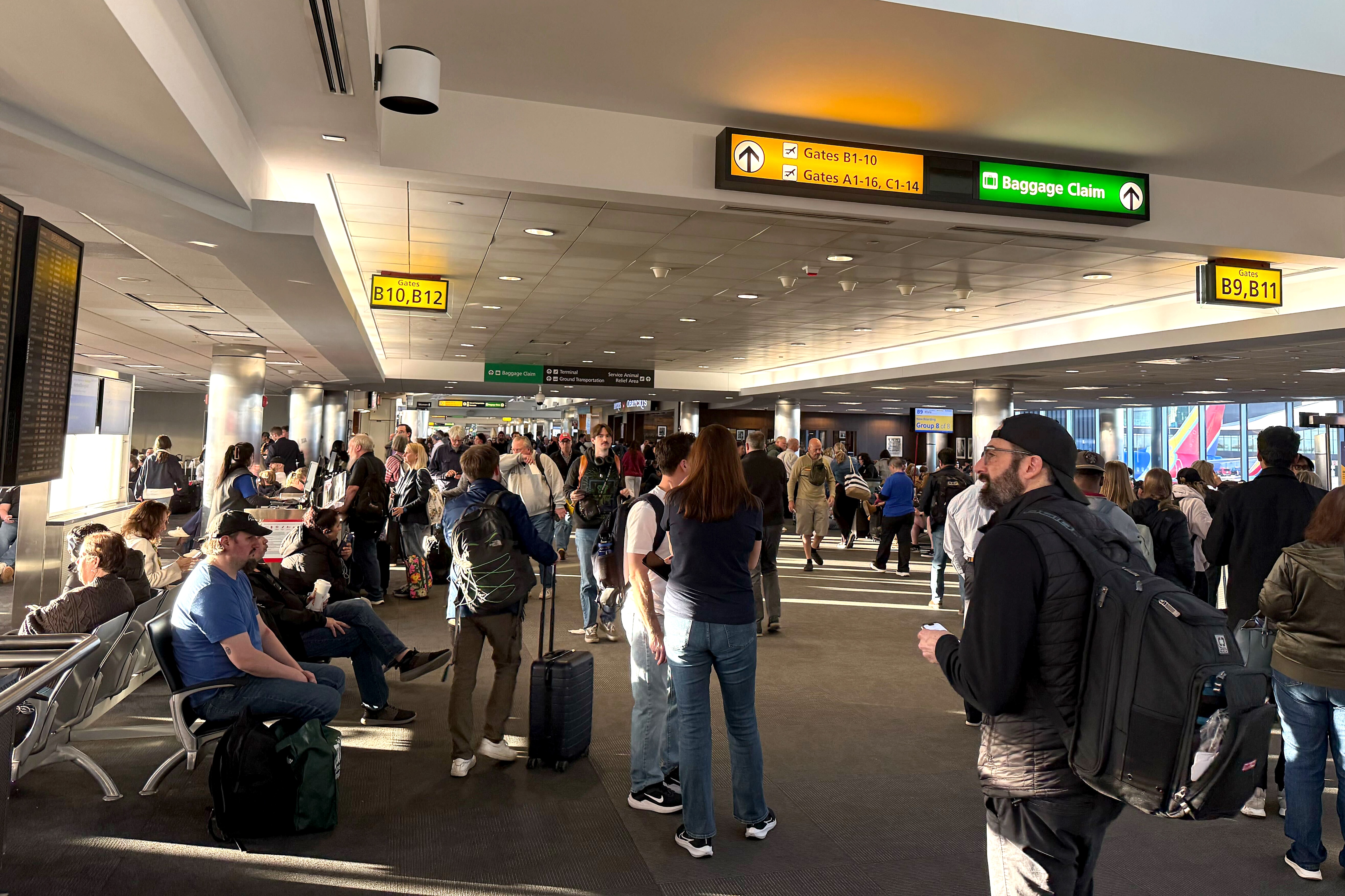 Stranded travelers crowd the Southwest domestic terminal at Baltimore-Washington International Thurgood Marshall Airport on Friday after a ground stop due to a “strong chemical smell” at the region’s air traffic control facility, a Federal Aviation Administration spokesperson said in an email.