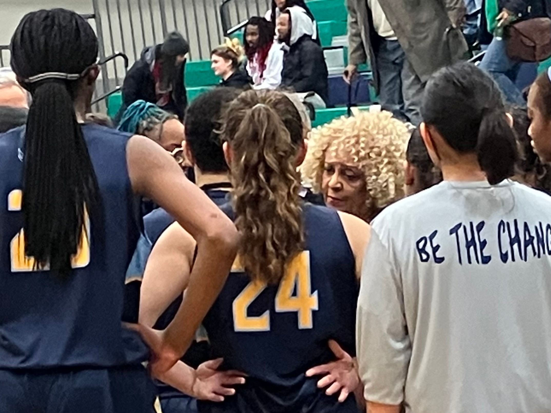 River Hill coach Teresa Waters (center) talks to her team during a timeout in Friday's Class 3A state quarterfinal against St. Charles. Down 15 points in the second half, the Hawks rallied to take the lead late in regulation, but host St. Charles scored the final four points to take a 51-48 victory to advance to the state semifinals.