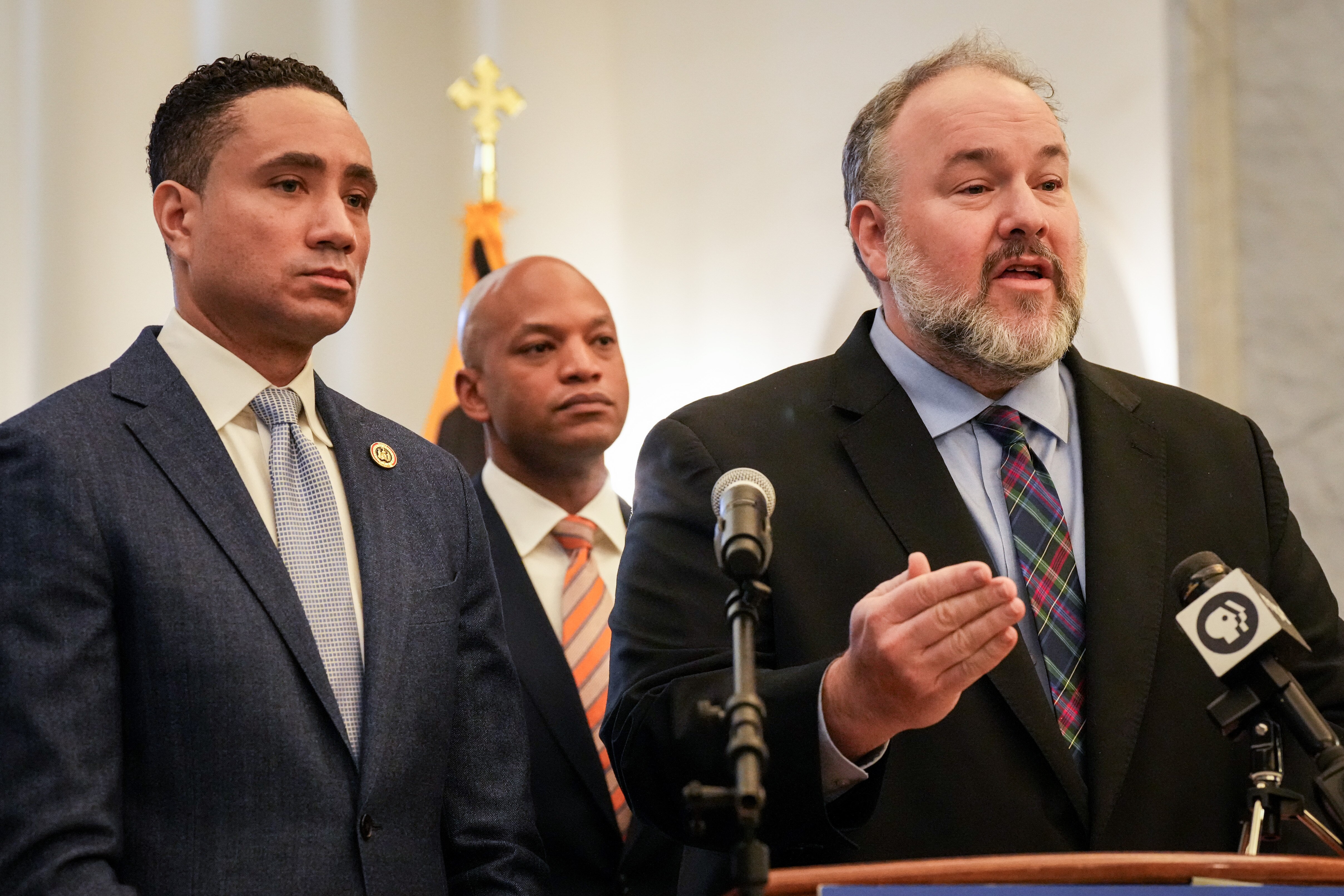 Del. Luke Clippinger, chairman of the House Judiciary Committee, right, announces new juvenile justice legislation in the Maryland State House lobby on Jan. 31, 2024. Beside him are Sen. Will Smith, chairman of the Senate Judicial Proceedings Committee, and Gov. Wes Moore.