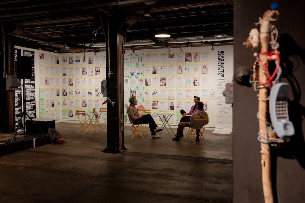 Lee Davis, Bruce Willen, and Anand Pandian chat near their exhibition “Confluence: Reimagining Baltimore’s Waterways” at Area 405.