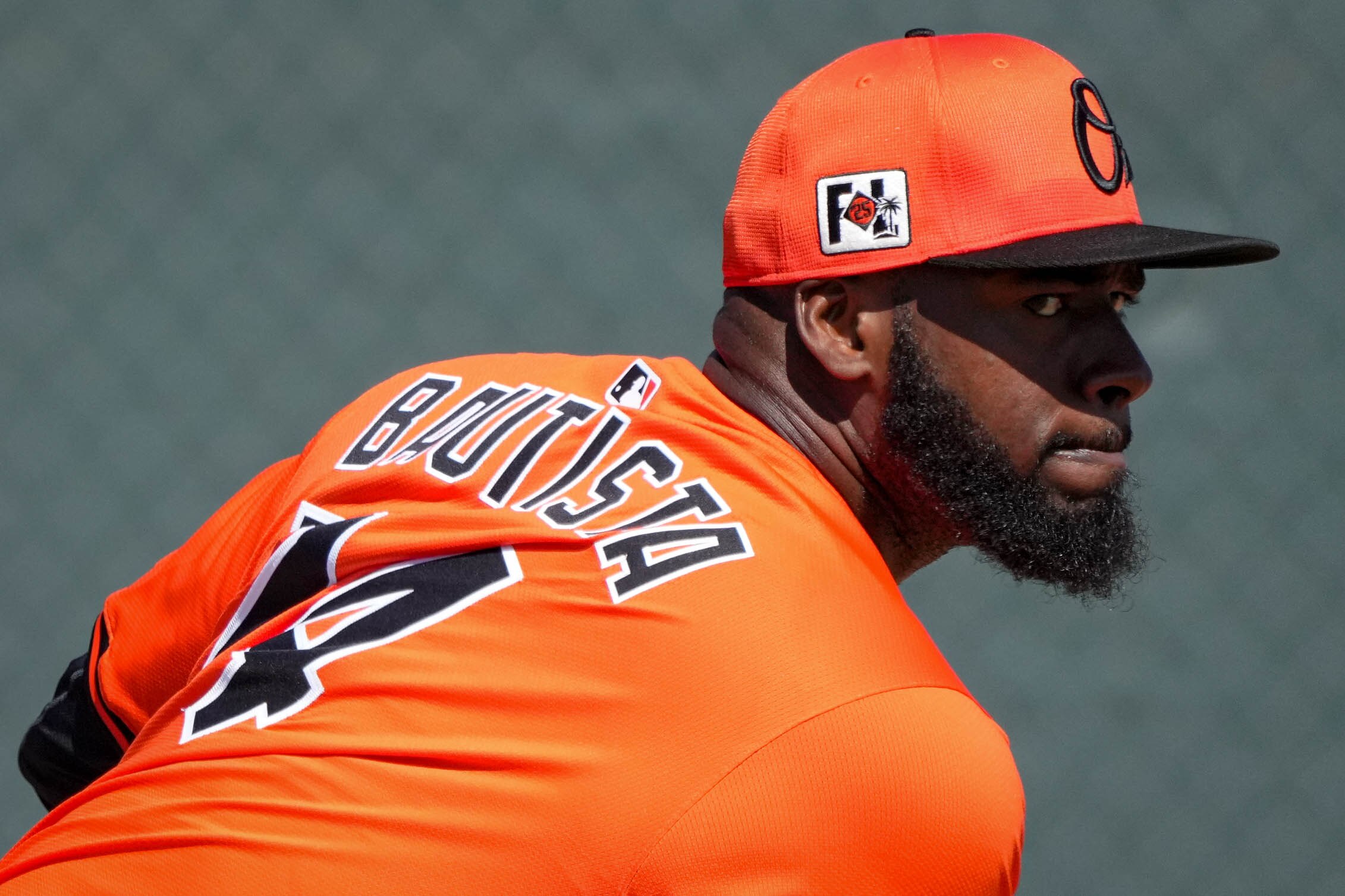 Baltimore Orioles pitcher Félix Bautista (74) throws a bullpen session at Ed Smith Stadium on Sunday, Feb. 23.