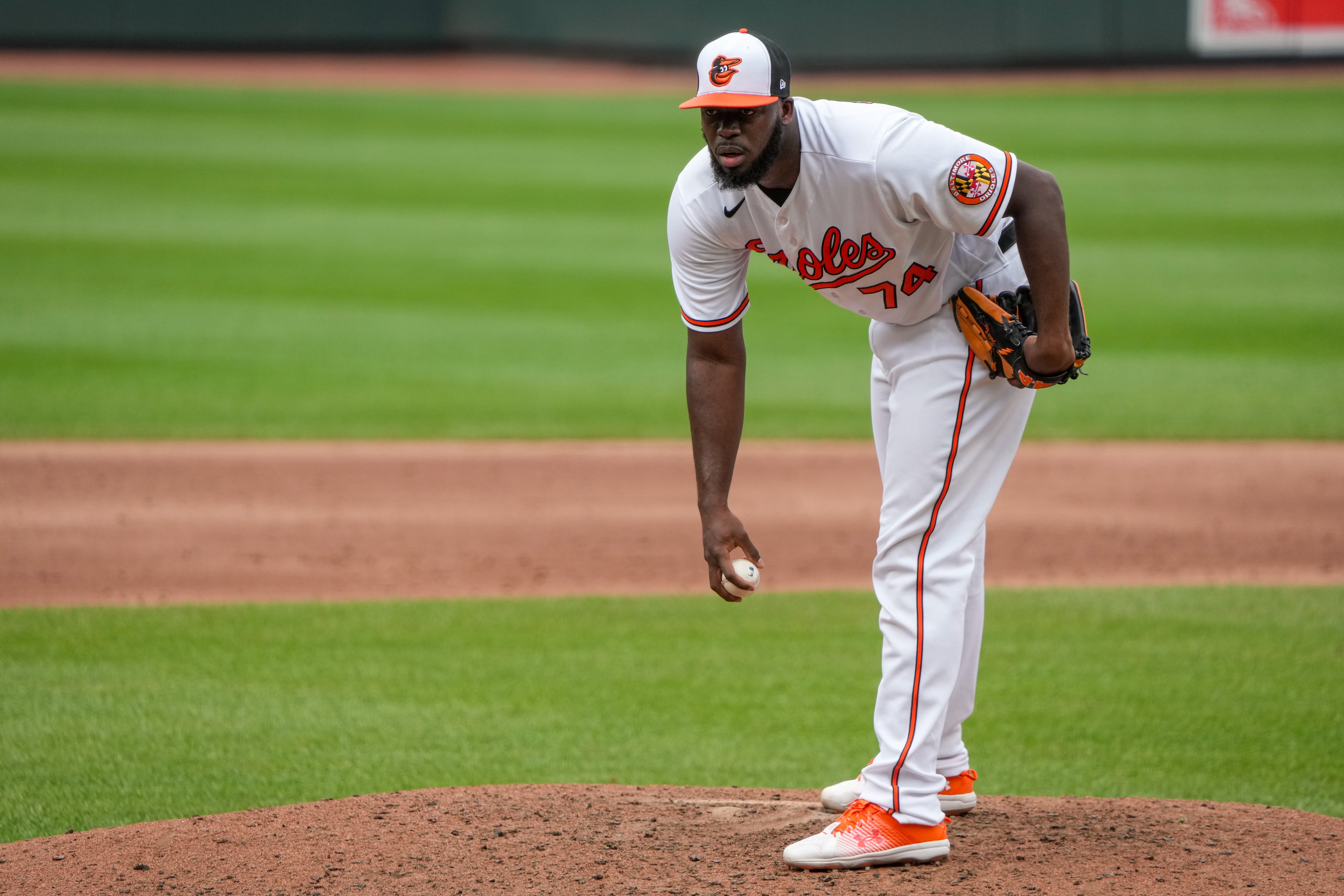 Baltimore Orioles relief pitcher Felix Bautista (74) gets ready to pitch in the ninth inning of a baseball game against the Houston Astros at Oriole Park at Camden Yards in Baltimore on Aug. 10, 2023.