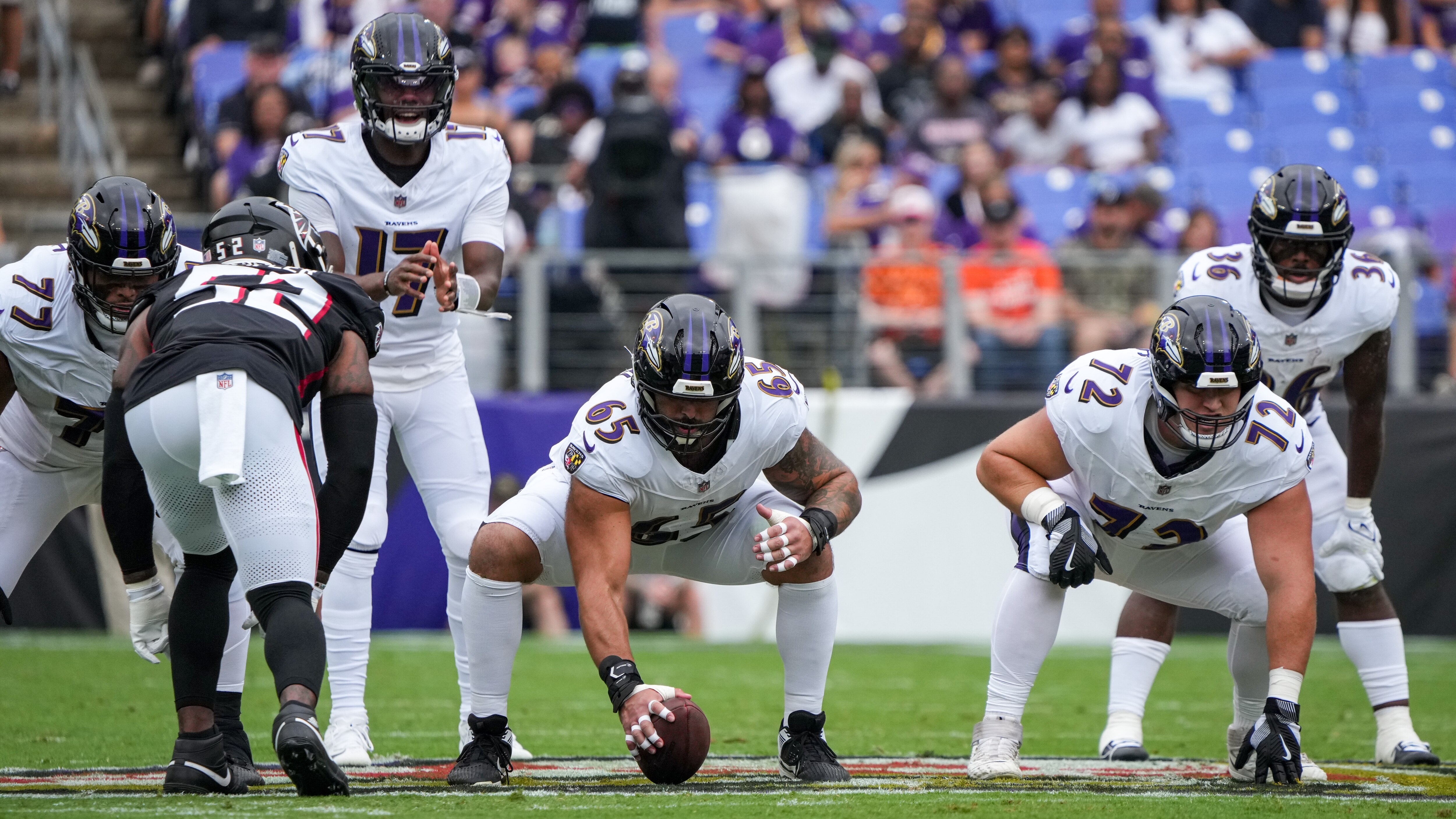Guard Daniel Faalele (77), center Patrick Mekari (65) and guard Andrew Vorhees (72) line up against the Atlanta Falcons.