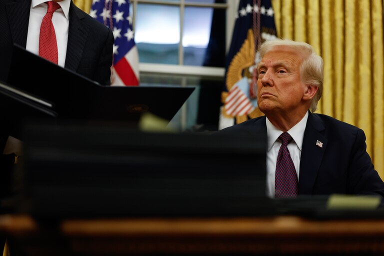 WASHINGTON, DC - JANUARY 20: President Donald Trump signs executive orders in the Oval Office on January 20, 2025 in Washington, DC. Trump takes office for his second term as the 47th president of the United States.