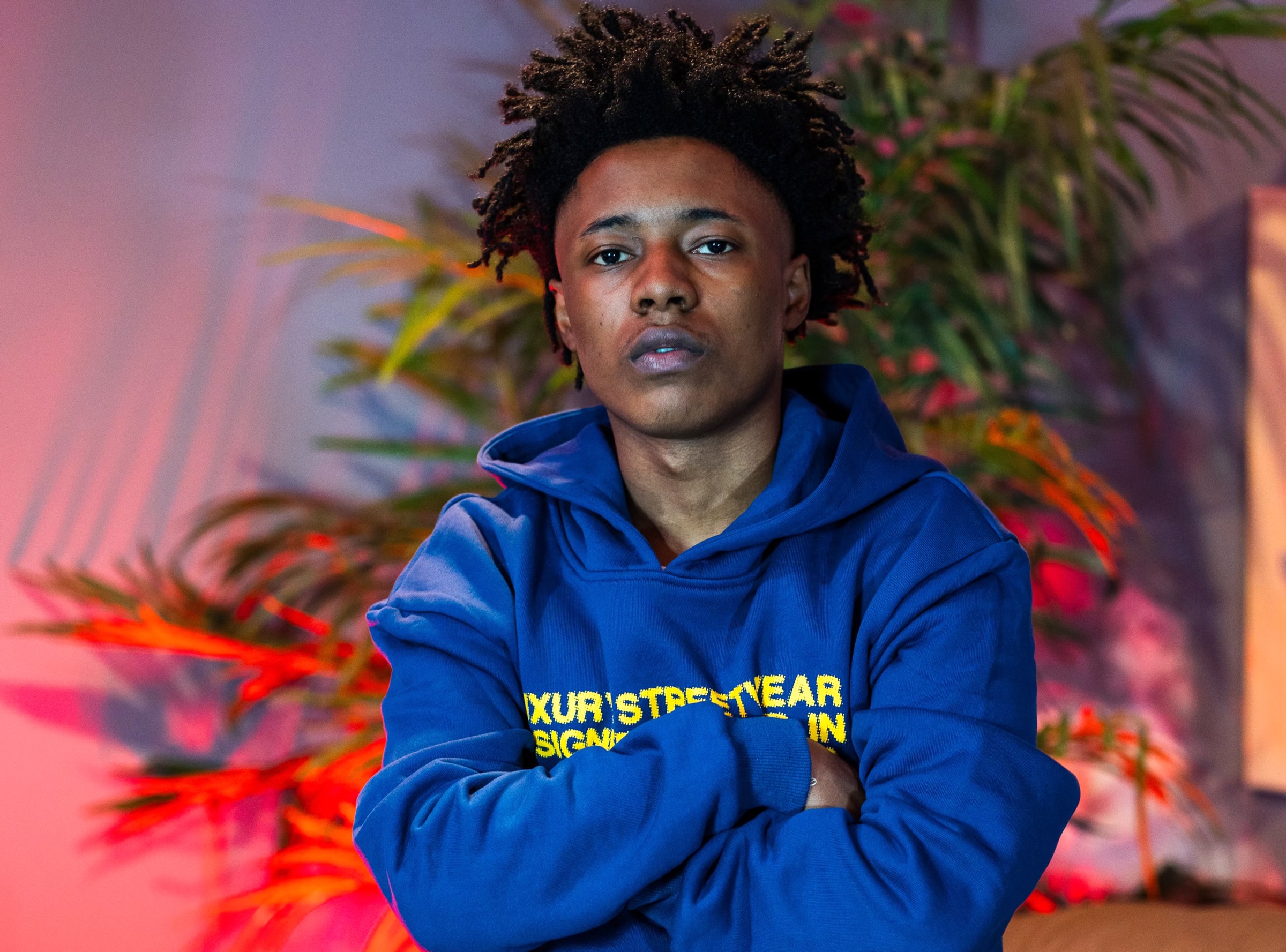 Comedian Reggie Travers poses during a media appearance.