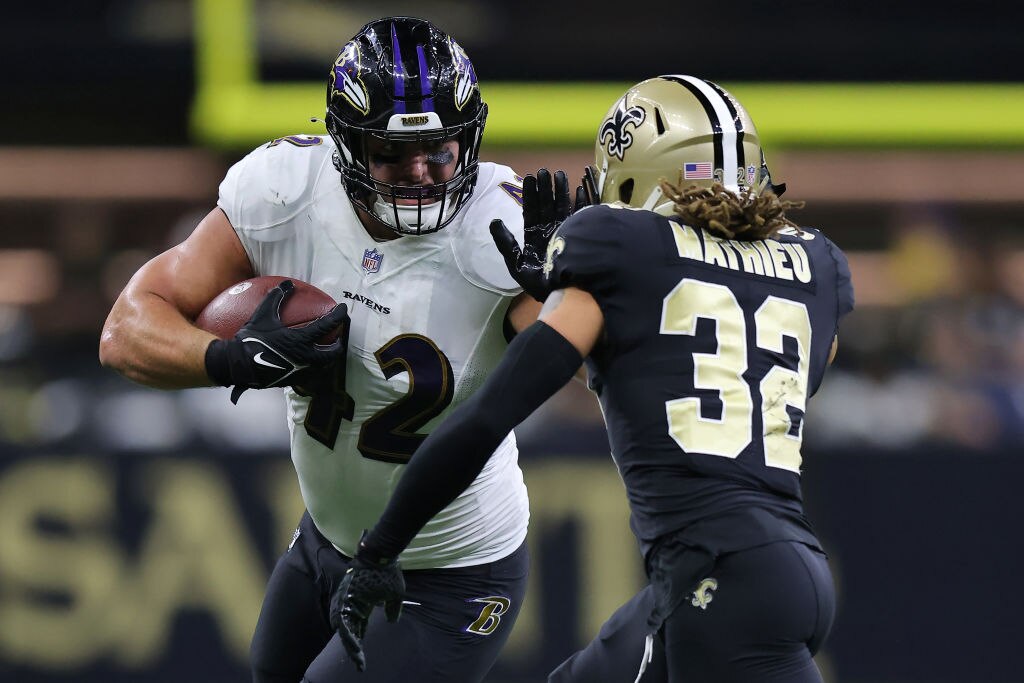 NEW ORLEANS, LOUISIANA - NOVEMBER 07: Patrick Ricard #42 of the Baltimore Ravens runs the ball against Tyrann Mathieu #32 of the New Orleans Saints during the third quarter at Caesars Superdome on November 07, 2022 in New Orleans, Louisiana. (Photo by Jonathan Bachman/Getty Images)