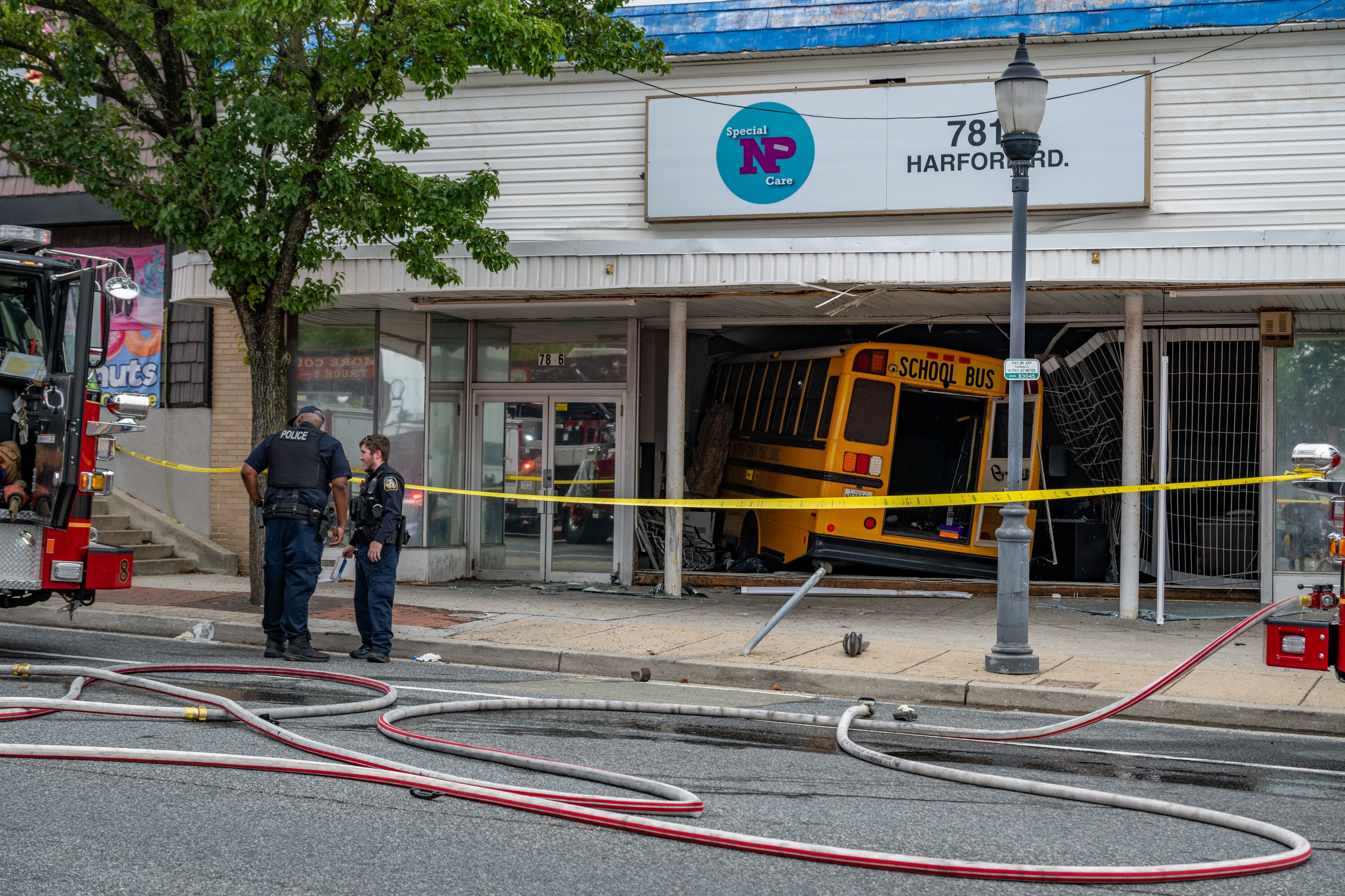 First responders are on the scene of an accident in the 7800 block of Harford Road where a school bus carrying children from the Maryland School for the Blind ended up in a building.