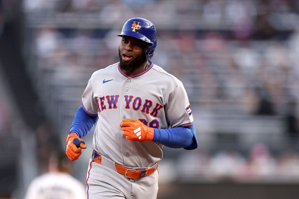 New York Mets outfielder Luis Robert Jr. celebrates hitting a two-run home run during the third inning against the Chicago White Sox on Aug. 22.