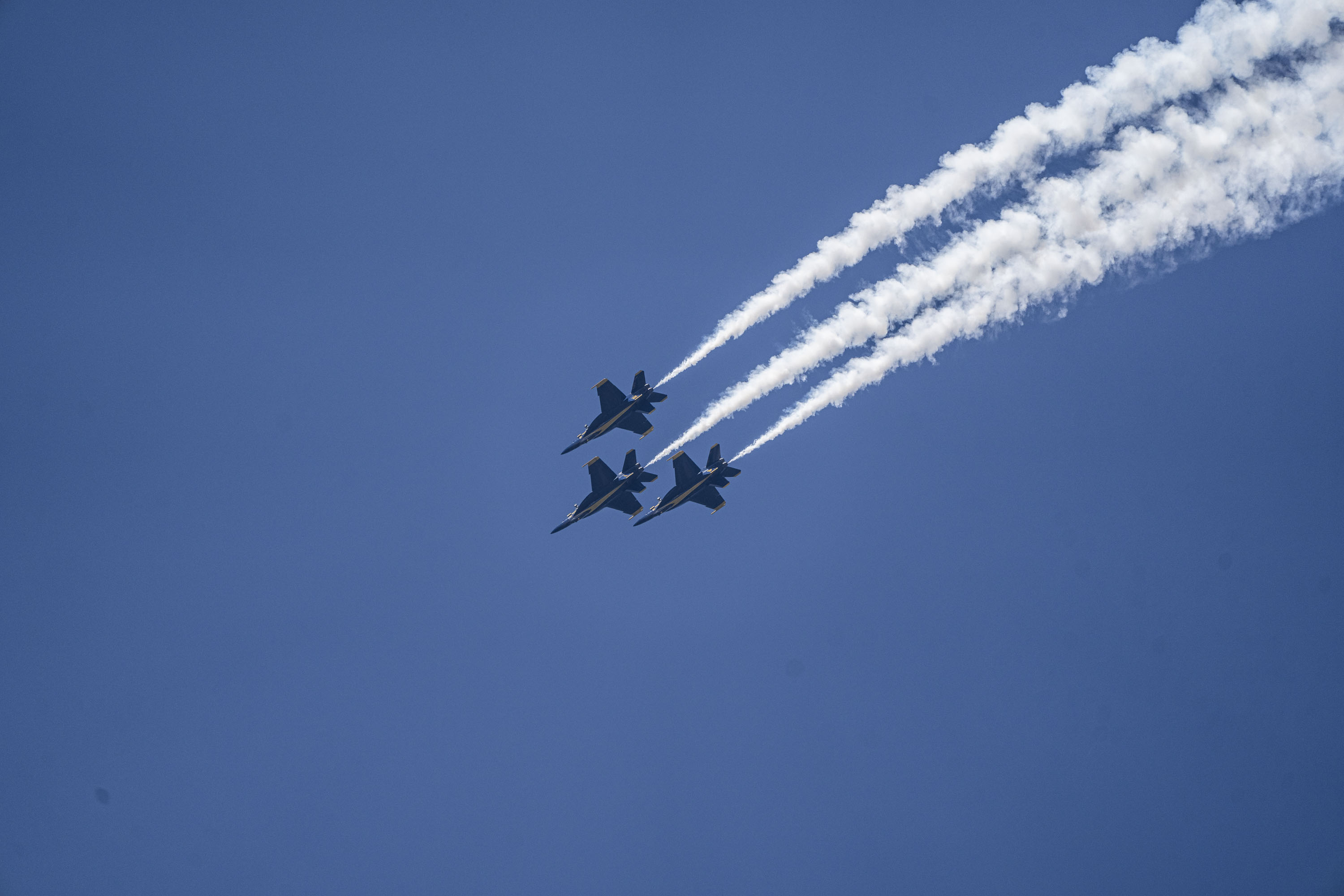 The Blue Angels complete their annual fly over Annapolis during the Naval Academy's commencement week on May 22, 2024. Spectators watched from City Dock.