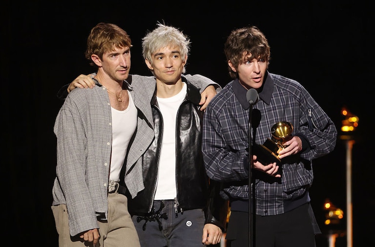 Pat McCrory, Daniel Fang and Brendan Yates of Turnstile accept the Best Rock Album award for "NEVER ENOUGH" onstage during the 68th GRAMMY Awards Premiere Ceremony at Peacock Theater on February 01, 2026 in Los Angeles, California.