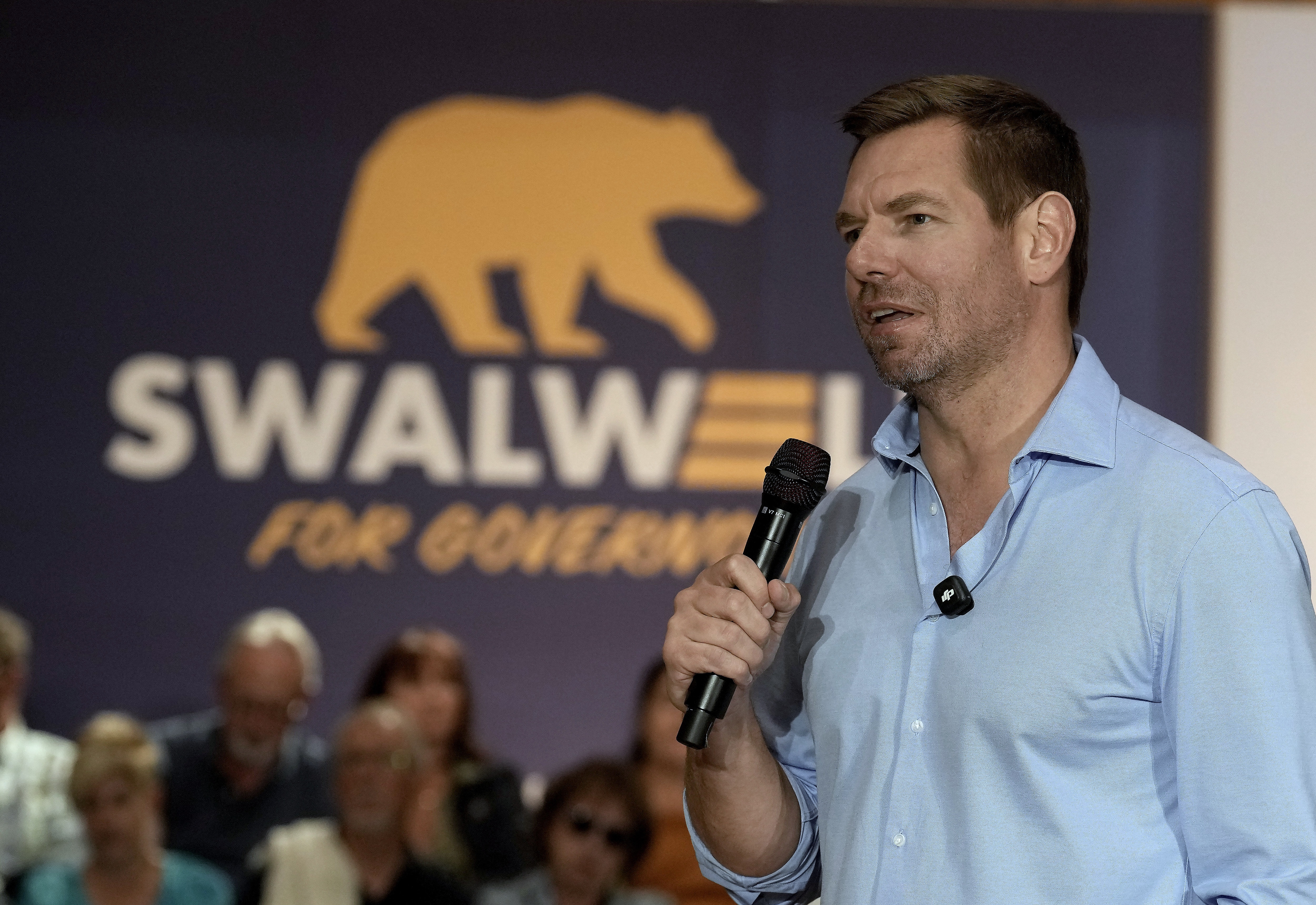California gubernatorial candidate, Rep. Eric Swalwell (D., Calif.), at a town hall meeting in Sacramento, Calif., on Tuesday. Swalwell has suspended his campaign and announced plans to resign his House seat amid sexual assault allegations.
