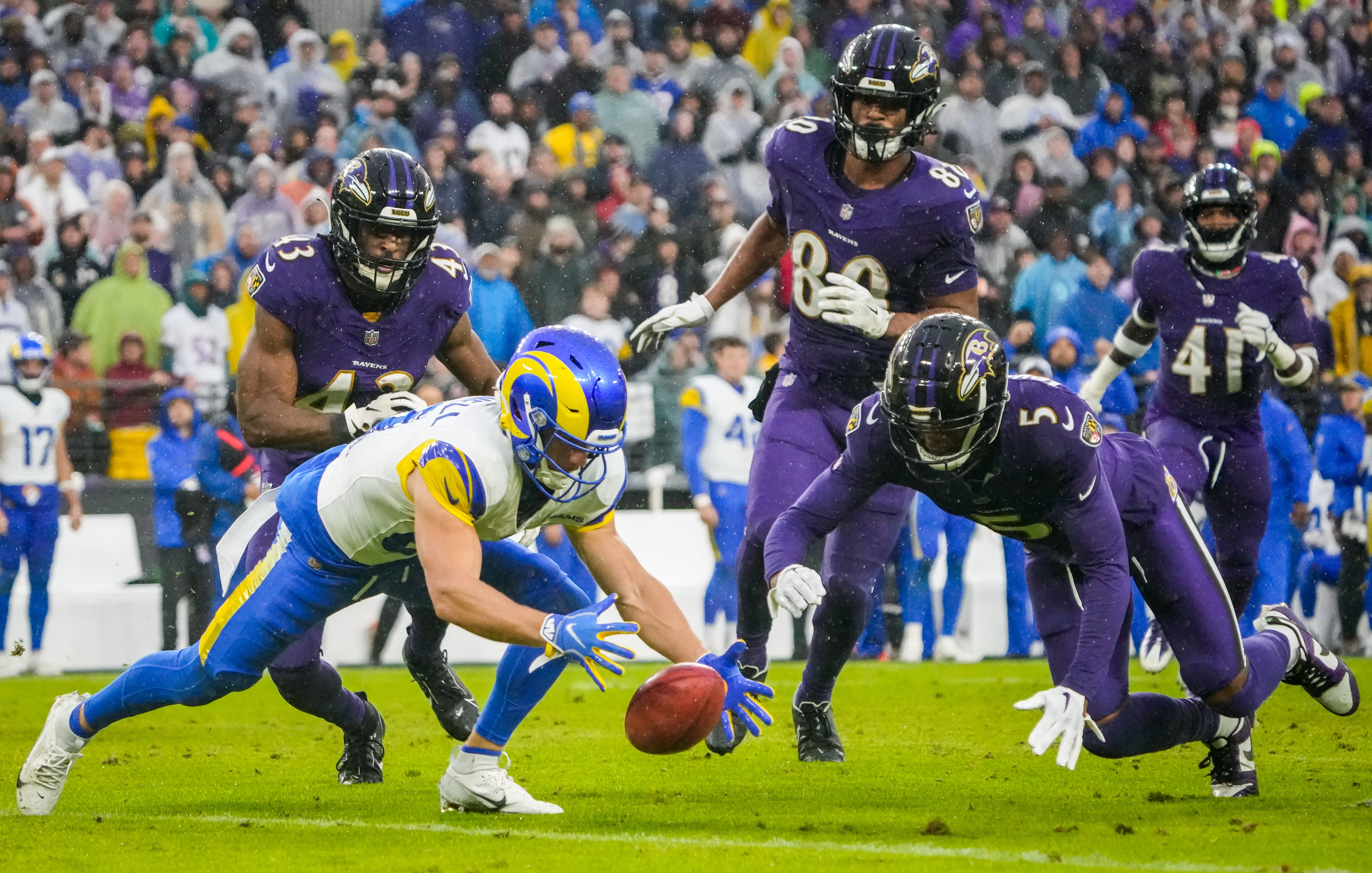 Ravens cornerback Jalyn Armour-Davis lunges for a punt muffed by Los Angeles Rams wide receiver Austin Trammell during a game this month.