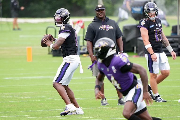 Baltimore Ravens quarterback Lamar Jackson (8) throws to wide receiver Zay Flowers (4) during the team’s training camp at the Under Armour Performance Center in Owings Mills, Md. on Tuesday, August 19, 2025.